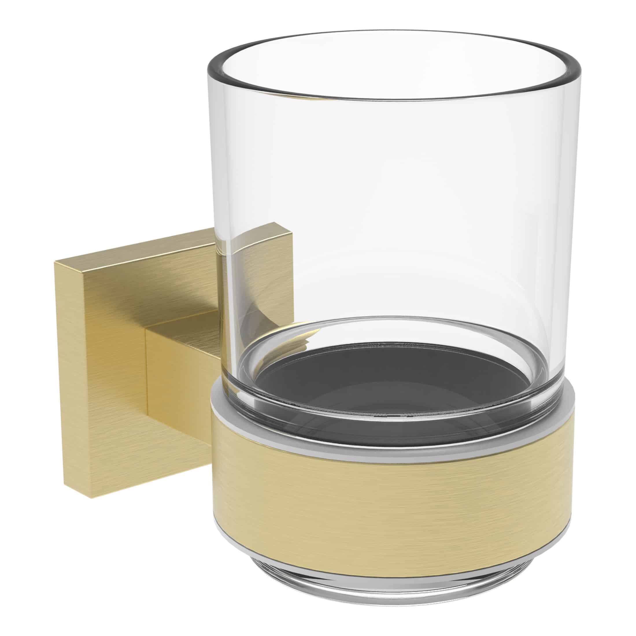 Sleek modern bathroom soap dispenser with a brass finish wall mount, transparent glass container, and black accents, perfect for luxury bathroom decor and convenient hand hygiene.