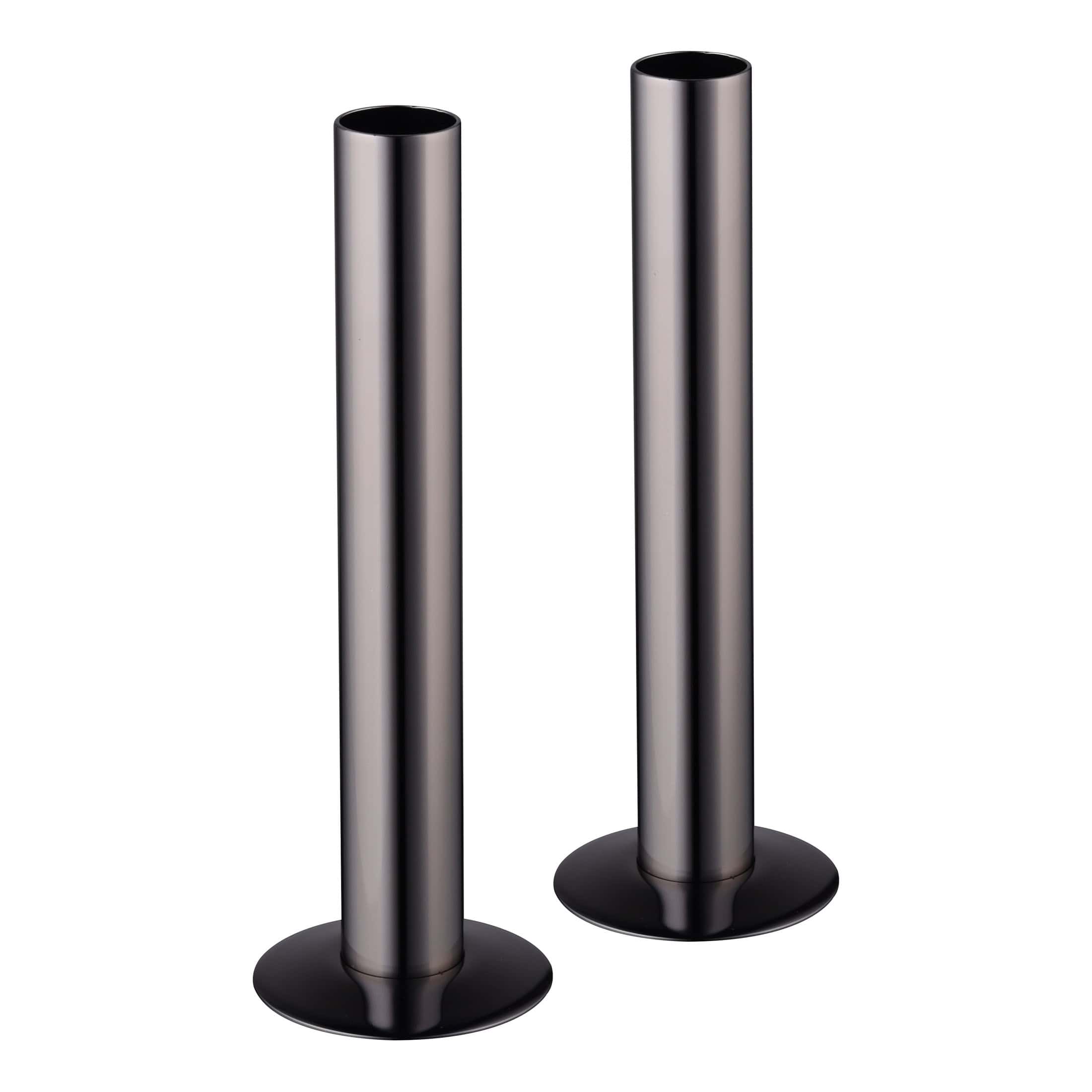 Polished stainless steel bathroom free-standing towel rails on black bases, modern design, durable and sleek for luxury bathrooms. Perfect for hanging towels and bathrobes.