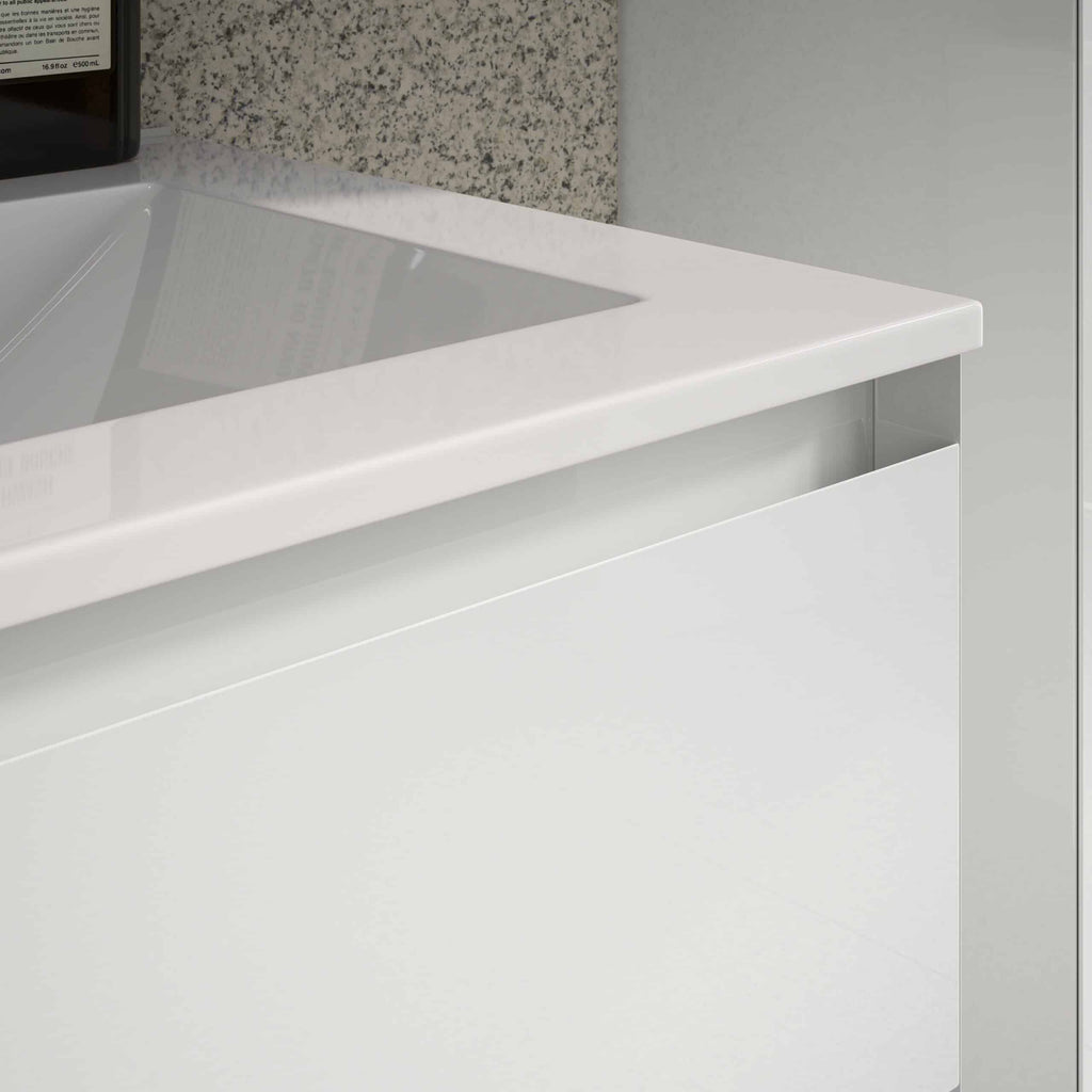 Shiny white bathroom sink with modern design and clean lines, part of Bubly Bathrooms' contemporary bathroom fixtures.