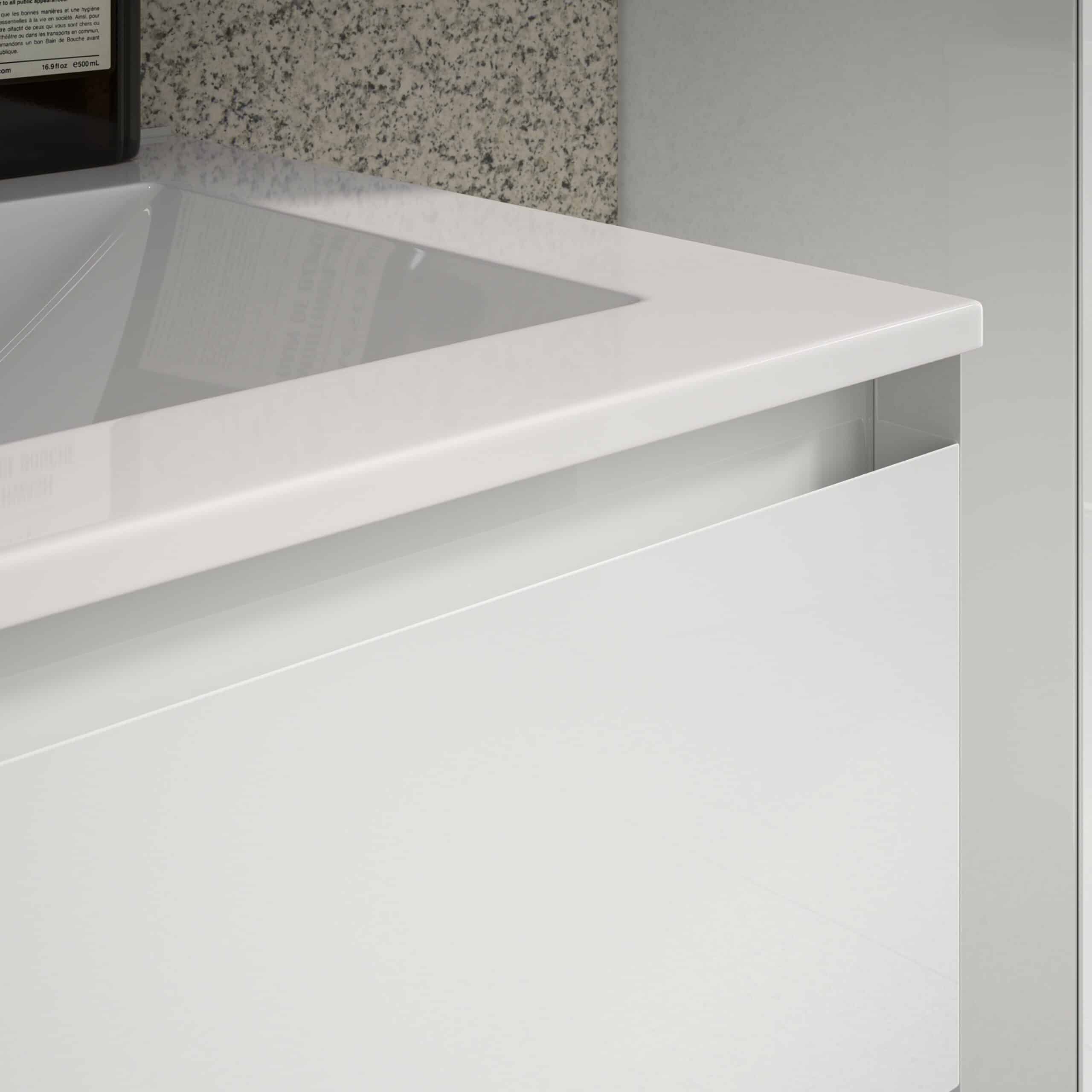 Shiny white bathroom sink with modern design and clean lines, part of Bubly Bathrooms' contemporary bathroom fixtures.