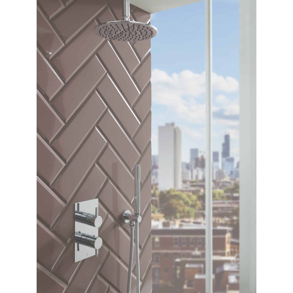 Contemporary shower panel with rainfall and handheld showerheads, sleek chrome fixtures, modern tiling, perfect for luxurious bathroom remodels and high-end bathroom designs.