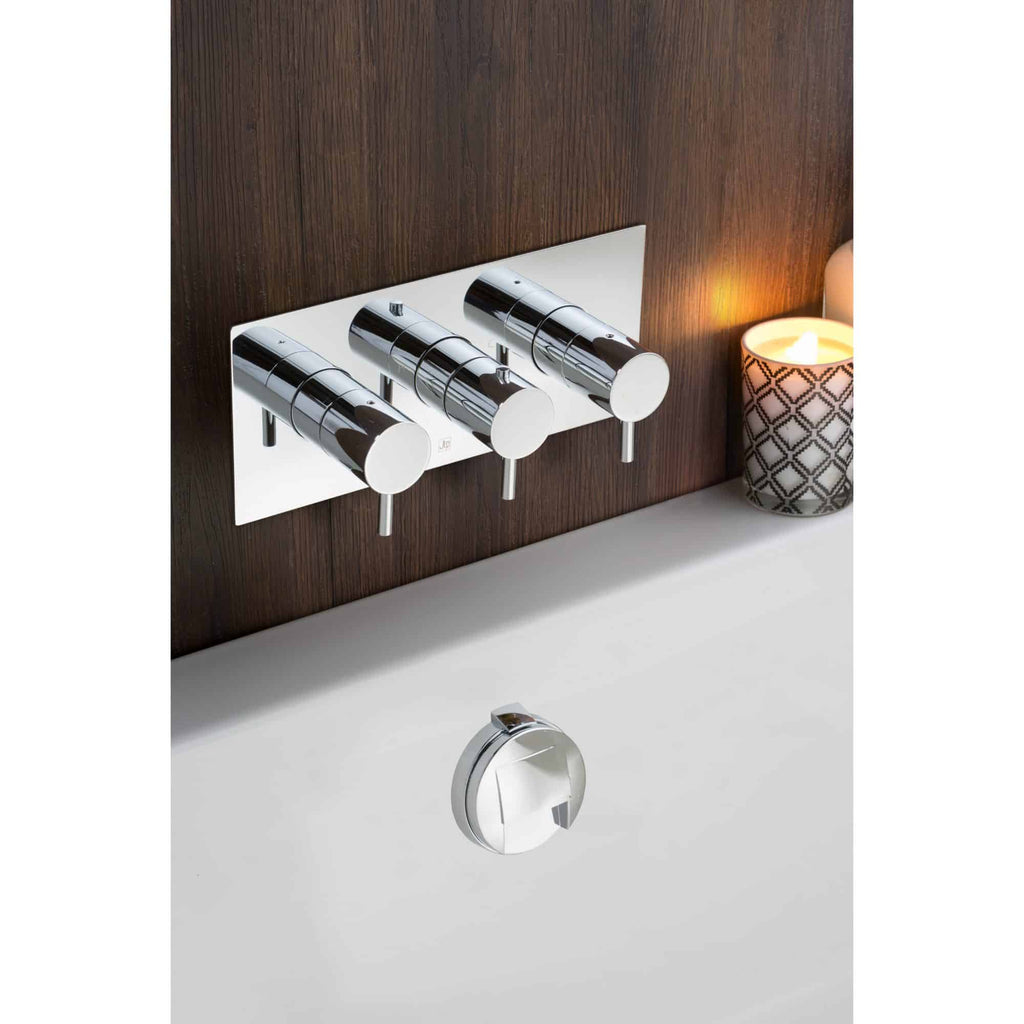 Sleek chrome wall-mounted bathroom tap set with three handles, modern design, and easy control for hot and cold water, ideal for contemporary bathroom renovation.