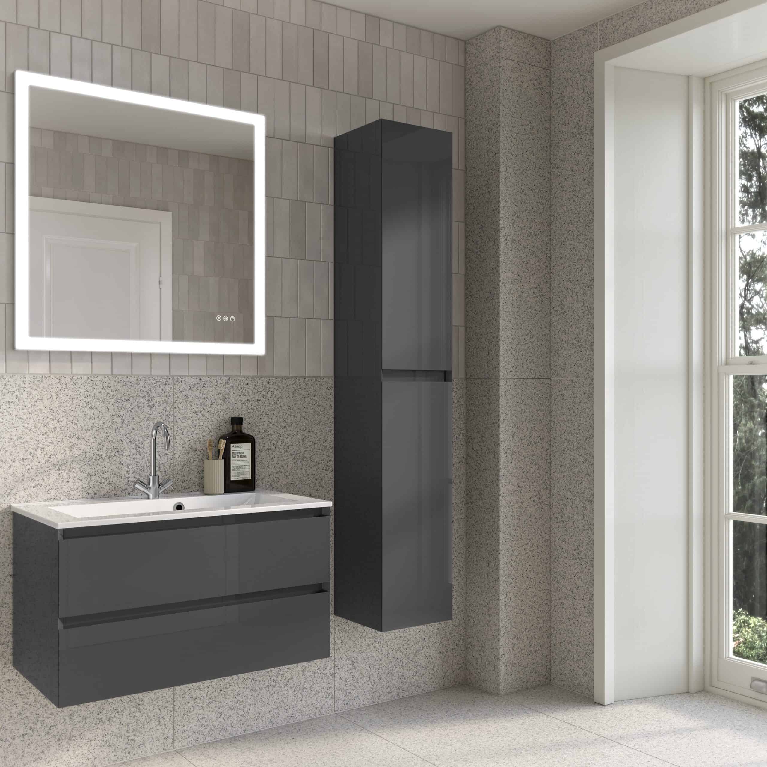 Contemporary grey bathroom vanity unit with integrated sink, wall-mounted mirrored cabinet, and storage tower in a modern bathroom setting with natural light.