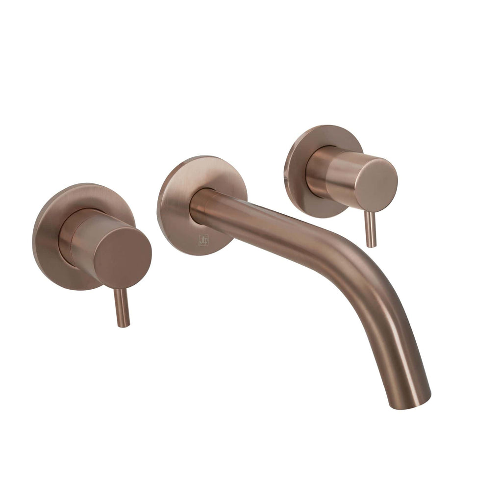 Sleek rose gold wall-mounted bathroom tap with matching handles, contemporary design perfect for modern bathrooms.