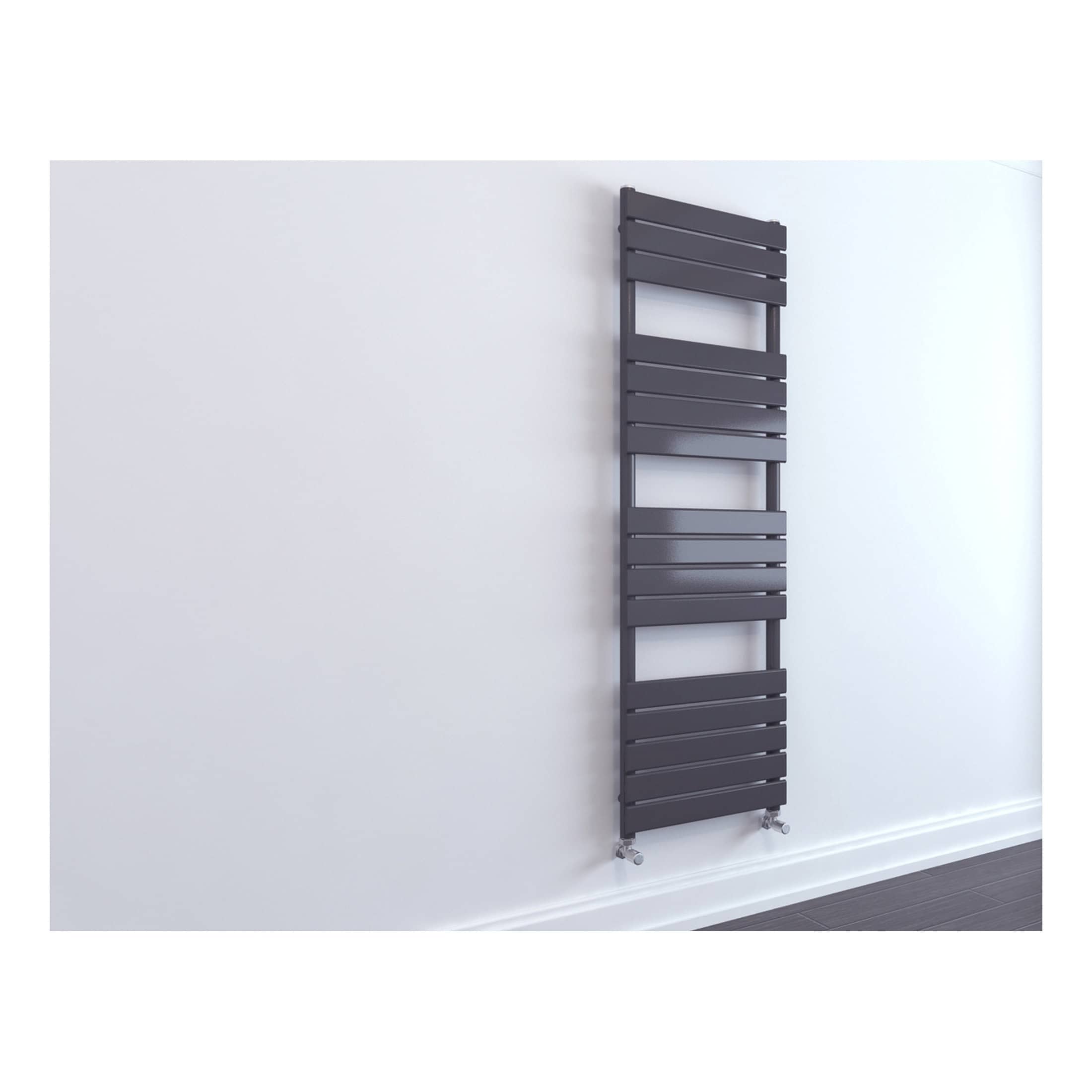 Vertical black towel radiator mounted on a white bathroom wall, modern heated towel rail for bathroom heating and drying towels.