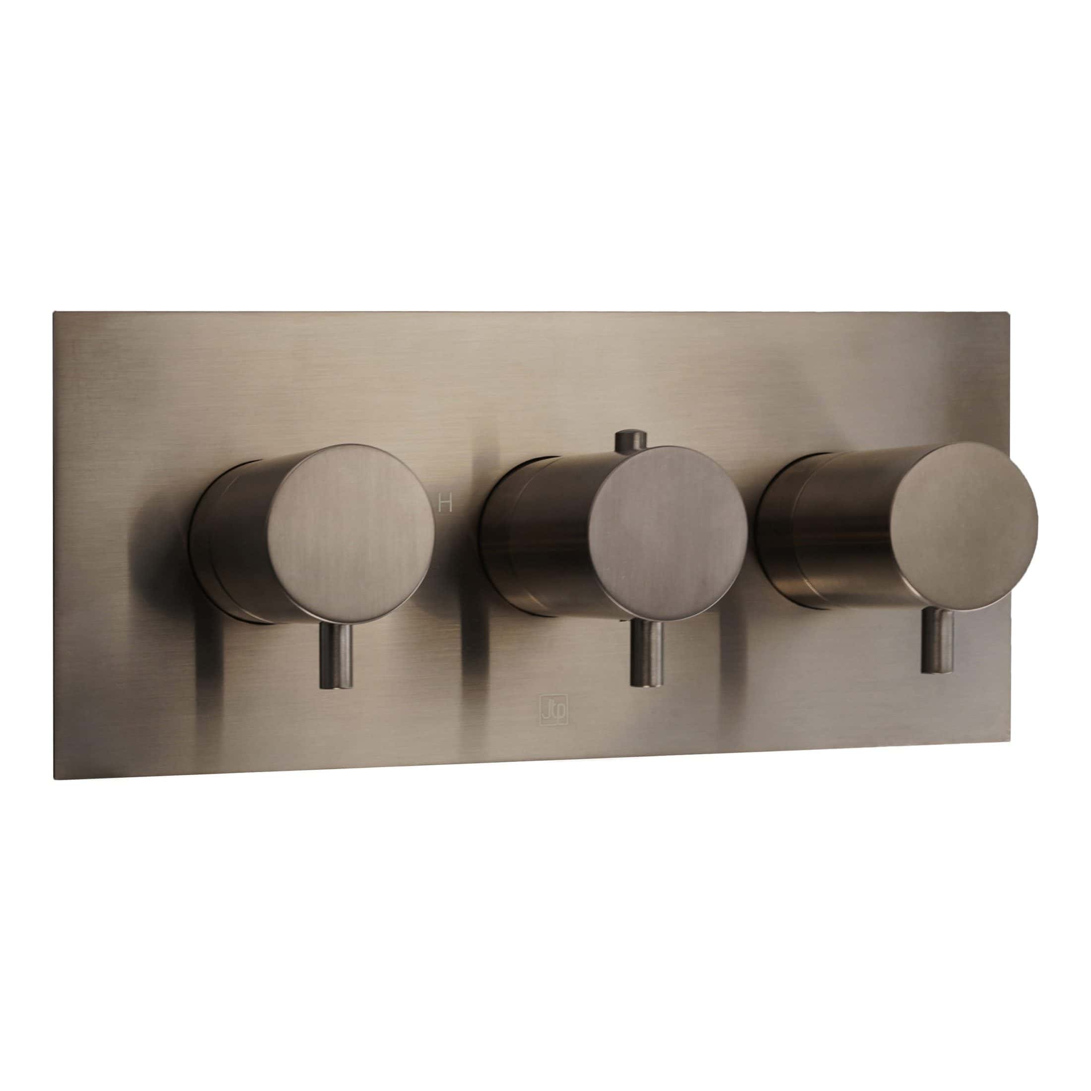Sleek brushed metal thermostatic shower valve with three control knobs on a rectangular wall plate for modern bathroom design.