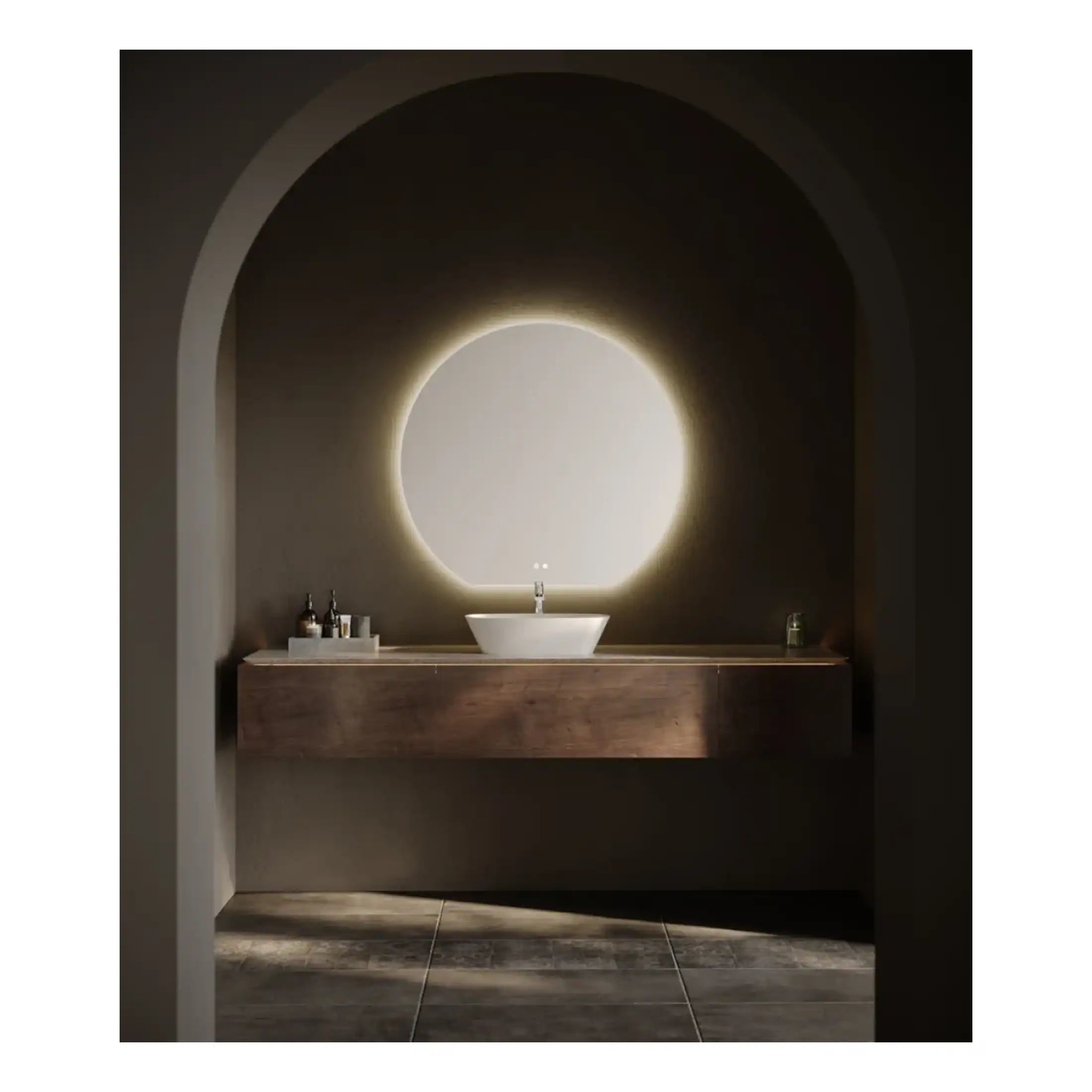 Sleek modern bathroom with a round backlit mirror, wall-mounted wooden vanity, and minimalist countertop sink, creating a stylish and tranquil bathroom space.
