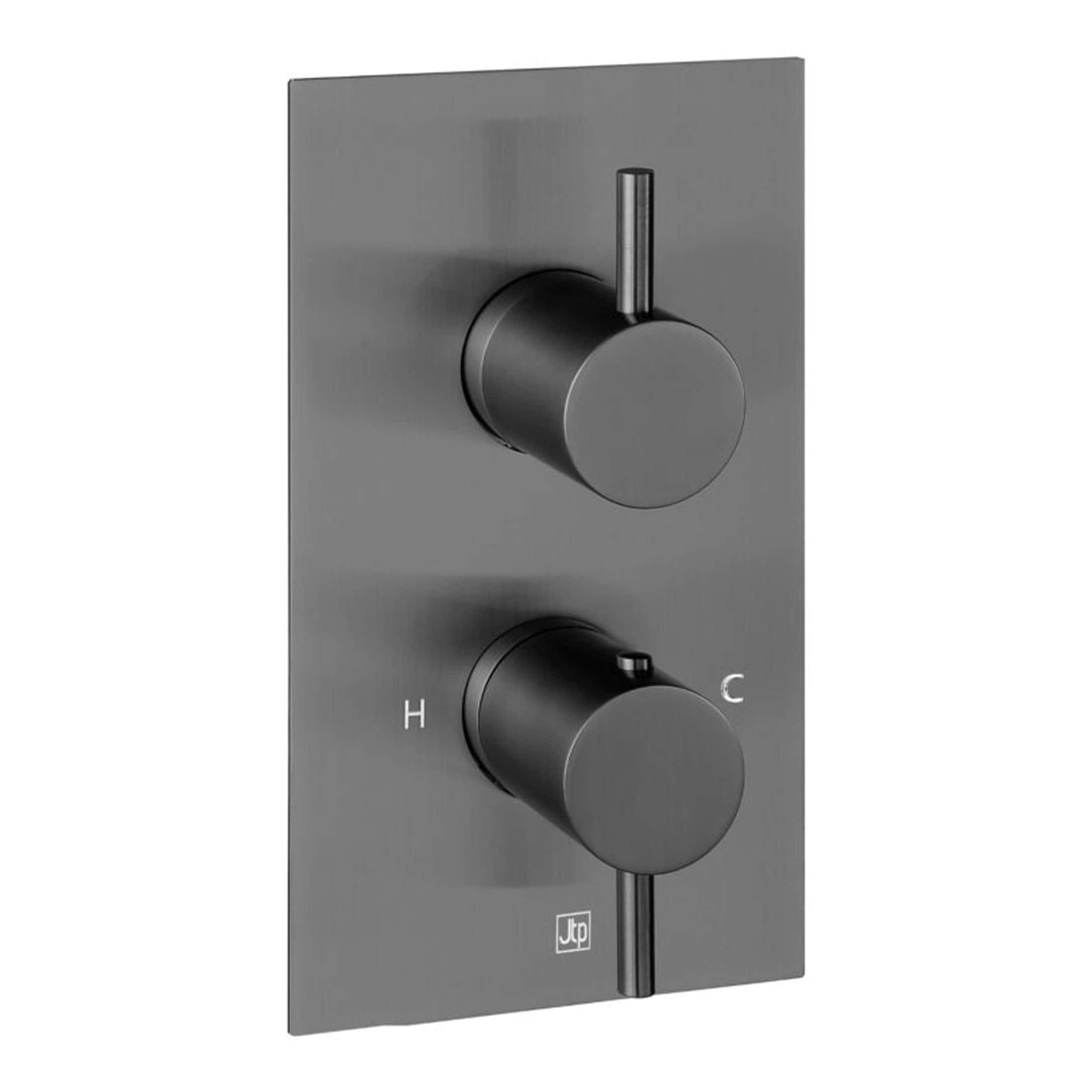 Sleek modern thermostatic shower control panel with dual dials for precise temperature and flow adjustment, ideal for contemporary bathrooms.