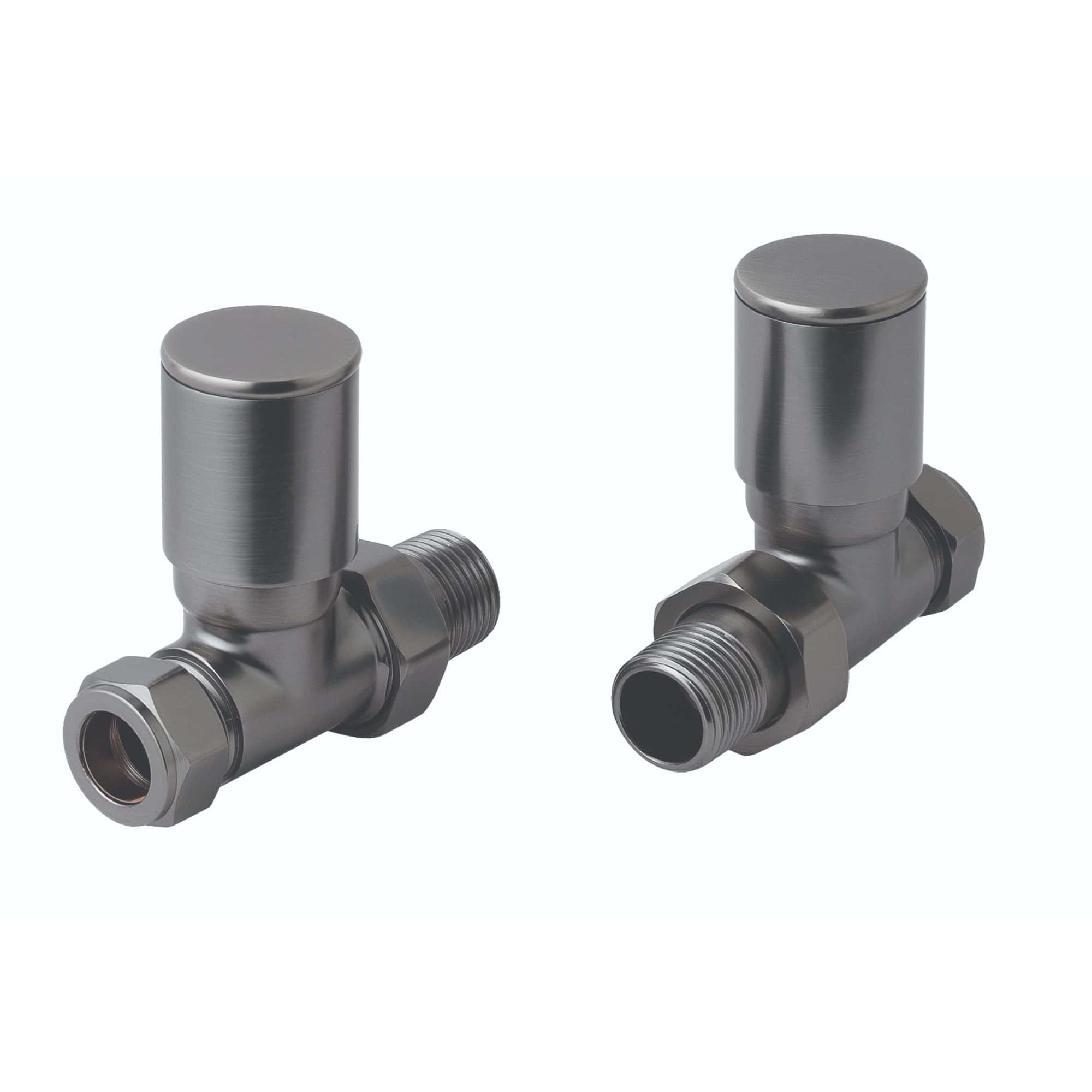 Shiny metallic angled radiator valves with threaded connections, ideal for modern bathroom heating systems. Perfect for replacing or refurbishing radiators with a sleek, contemporary design.