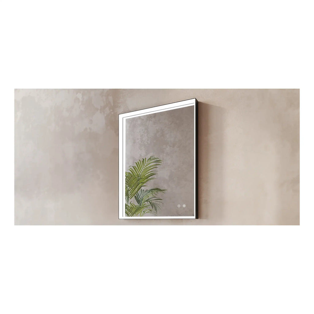 Sleek modern bathroom mirror with integrated LED lighting, mounted on a textured neutral wall, complemented by green plant reflection, ideal for contemporary bathroom design.