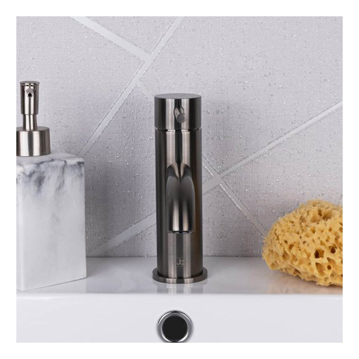 Sleek stainless steel bathroom tap with a modern design, featuring a cylindrical shape and easy-to-use control, ideal for contemporary bathroom decor.