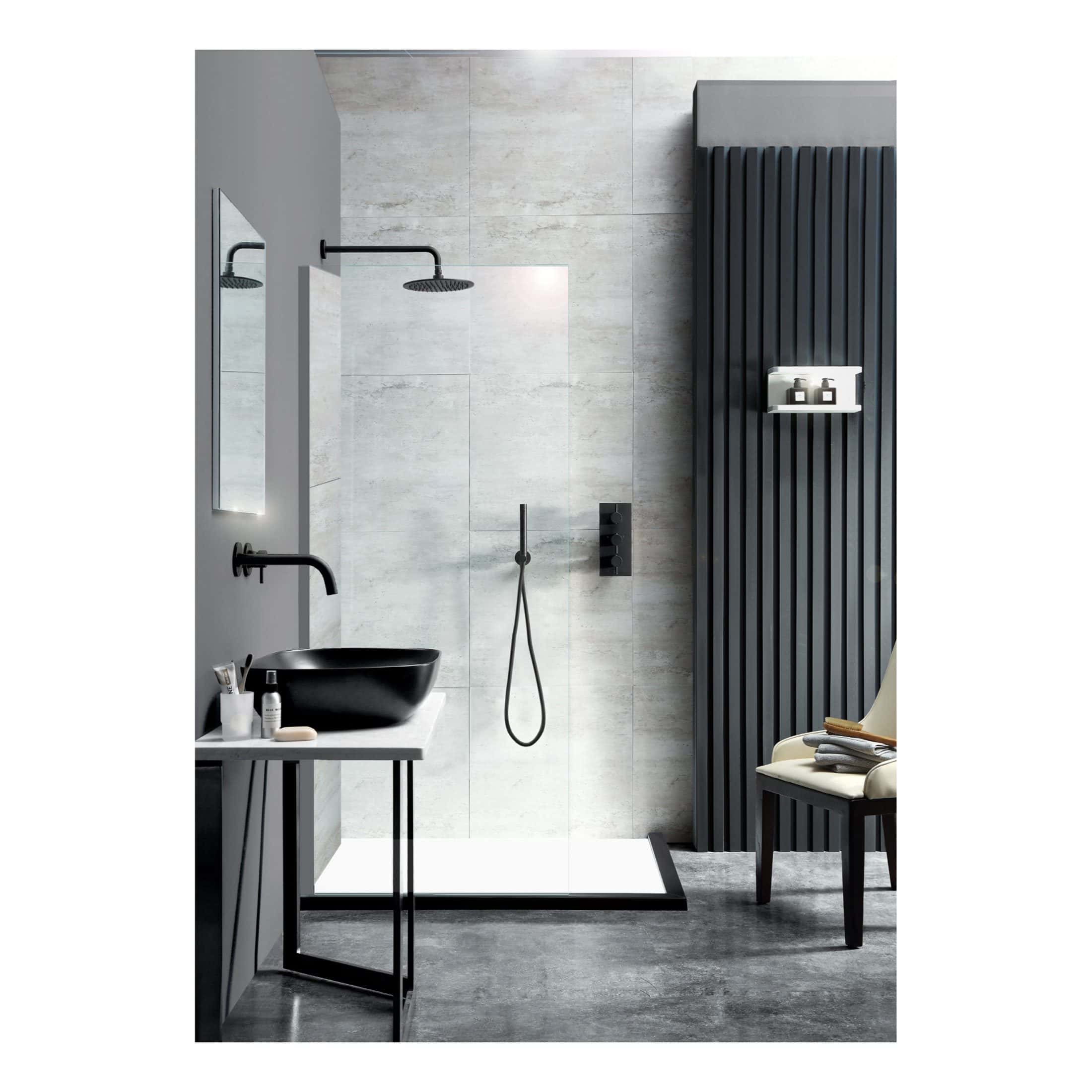 Modern black and grey bathroom with a walk-in shower, rainfall showerhead, black vessel sink, minimalist fixtures, and stylish seating area, showcasing contemporary bathroom design from Bubly Bathrooms.