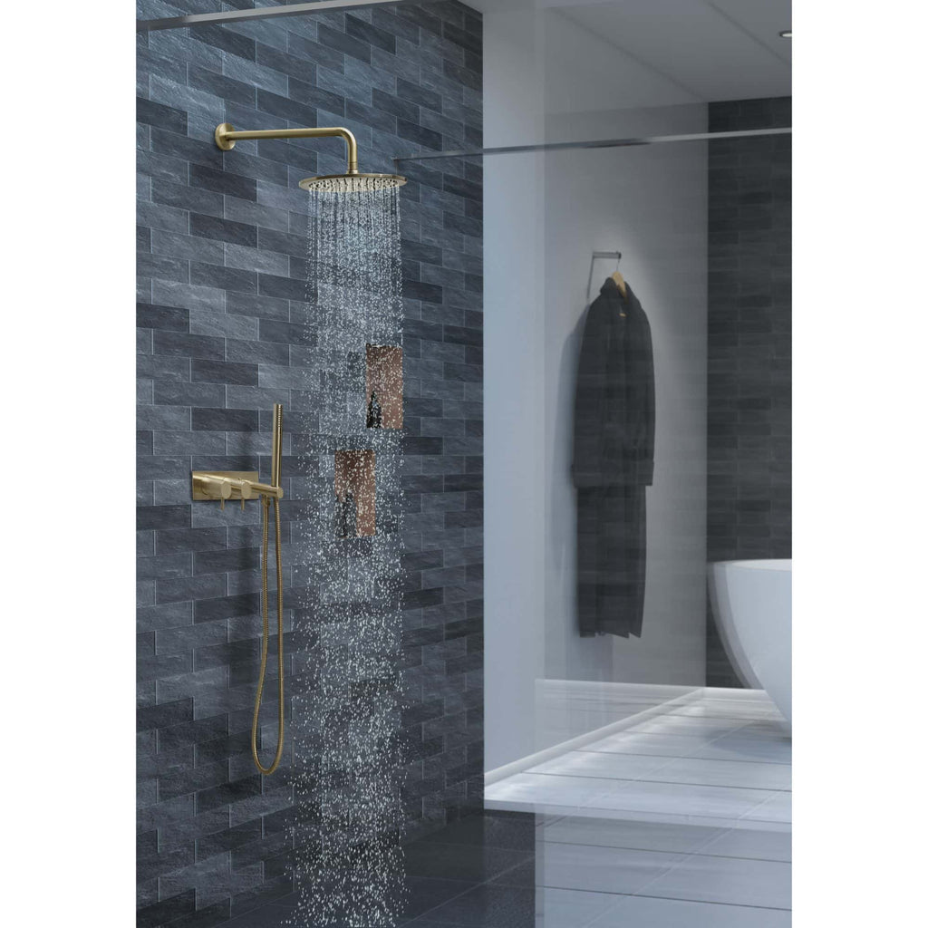 Elegant gold-finish rainfall showerhead in modern bathroom with dark grey tiled wall and minimalistic design.