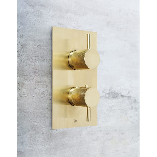 Sleek gold thermostatic shower valve with modern design for luxurious bathroom upgrade. Perfect for contemporary bathrooms, providing precise water control and stylish aesthetics.