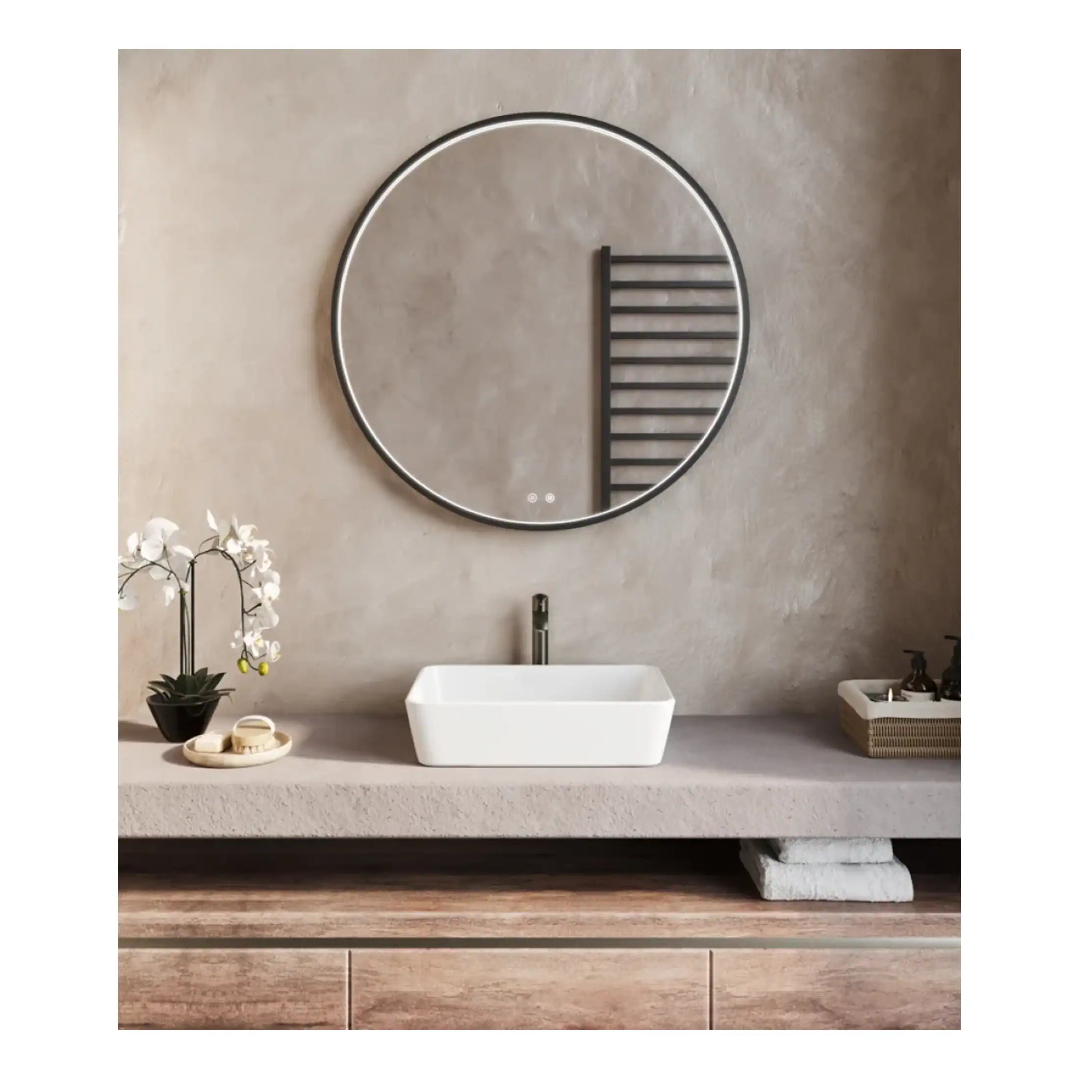 Modern minimalist bathroom vanity with a sleek rectangular vessel sink, surrounded by elegant accessories and a large round mirror, showcasing contemporary bathroom design ideas.