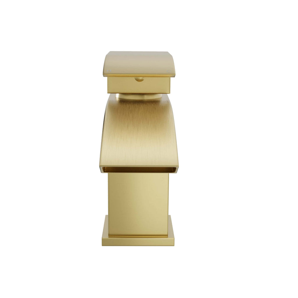 Gold bathroom accessories, including tissue box holder and storage stand, showcasing luxurious and elegant design for modern bathroom decor.