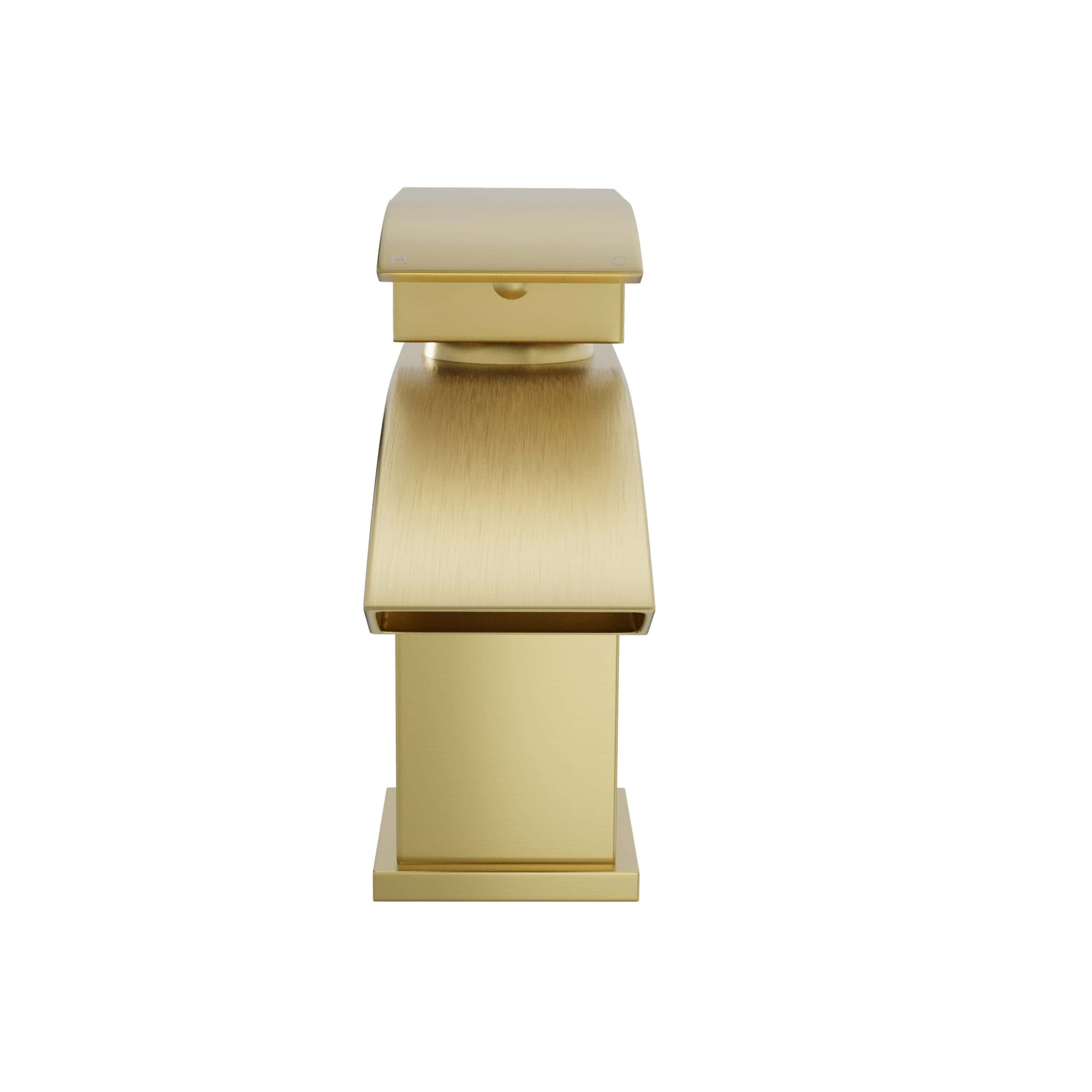 Gold bathroom accessories, including tissue box holder and storage stand, showcasing luxurious and elegant design for modern bathroom decor.