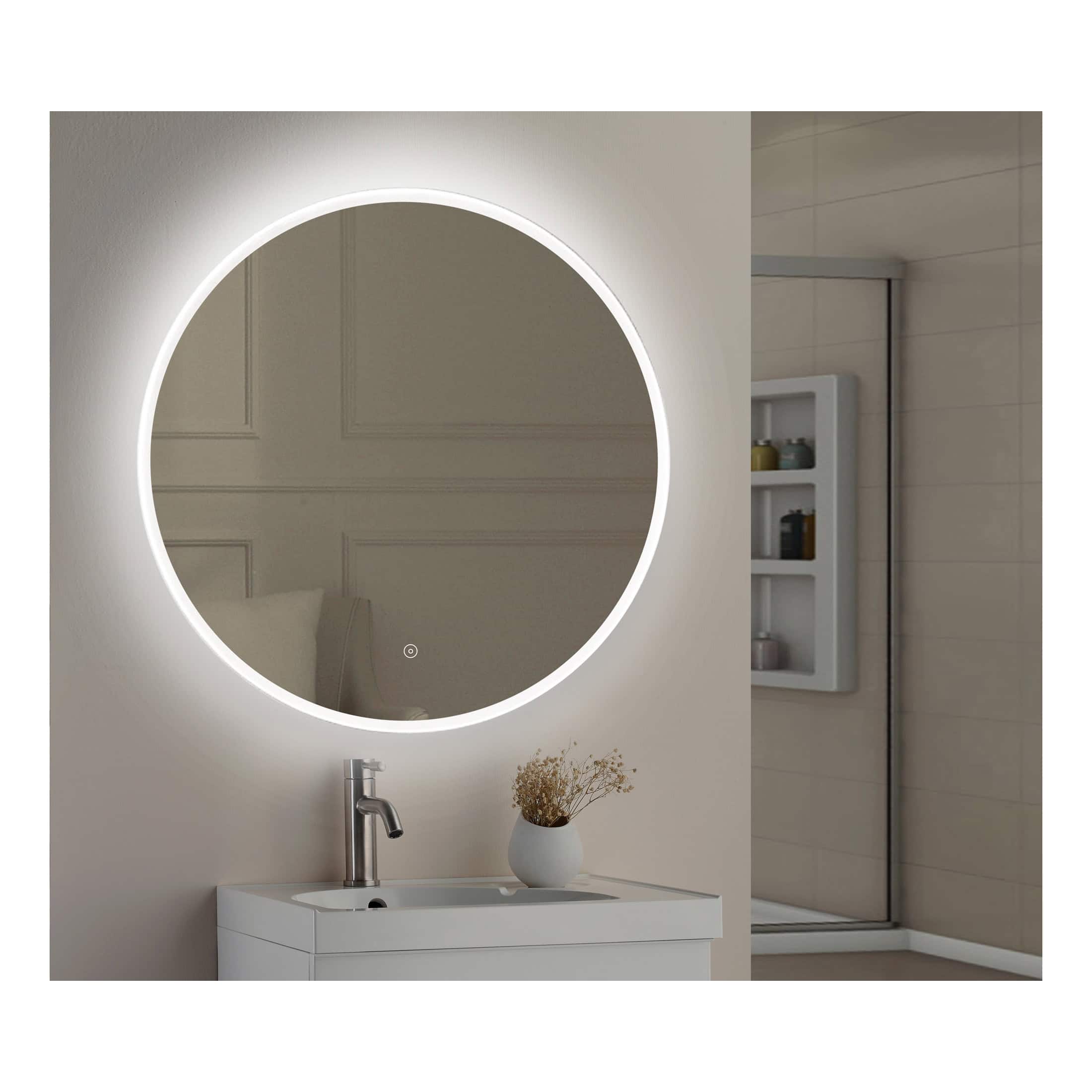 Illuminated round bathroom mirror with LED lighting, mounted above a modern white vanity with a grey tap, in a contemporary bathroom setting, enhancing bathroom decor and functionality.
