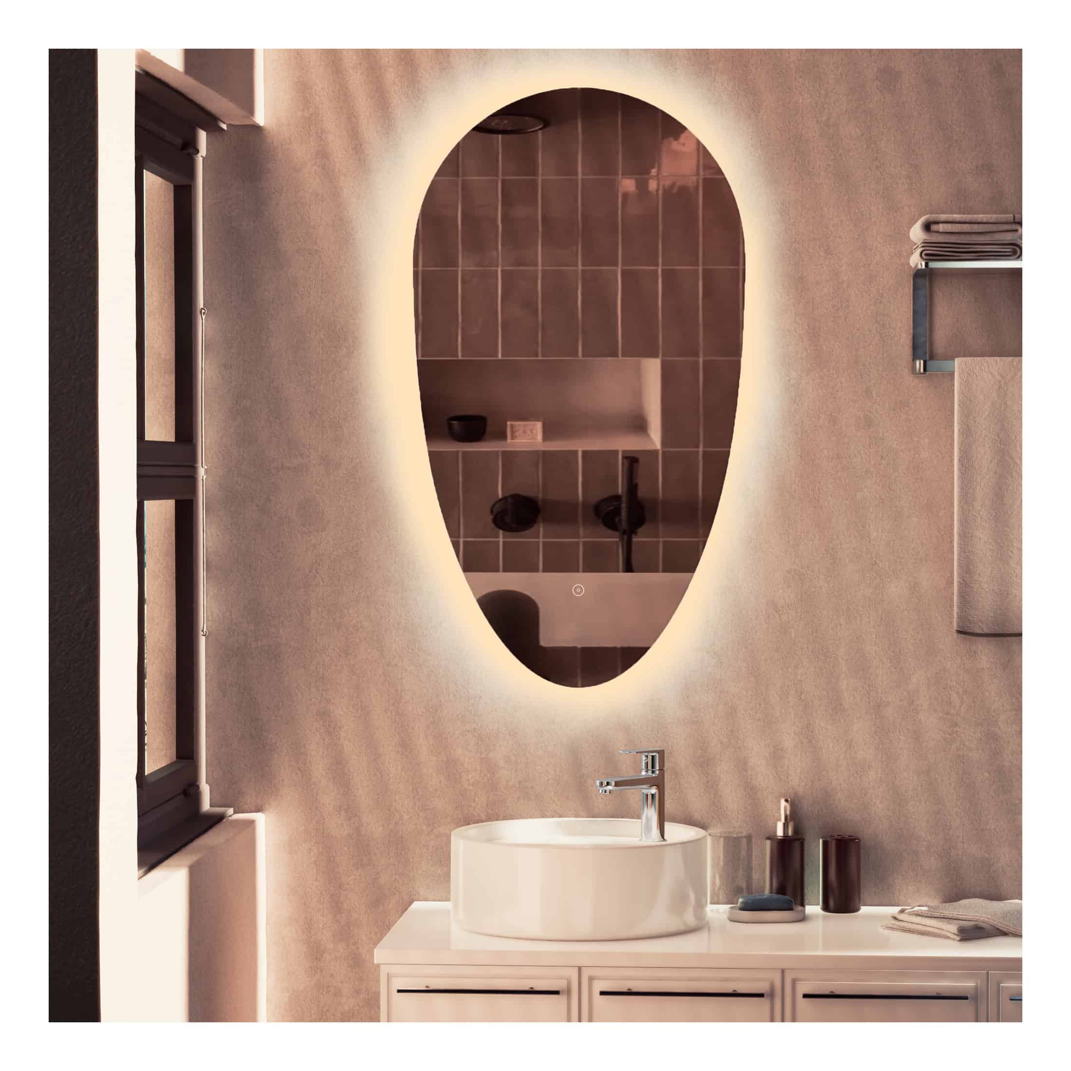 Modern bathroom vanity with illuminated oval mirror and vessel sink, minimalist design with neutral tones and sleek fixtures, perfect for contemporary bathroom décor.