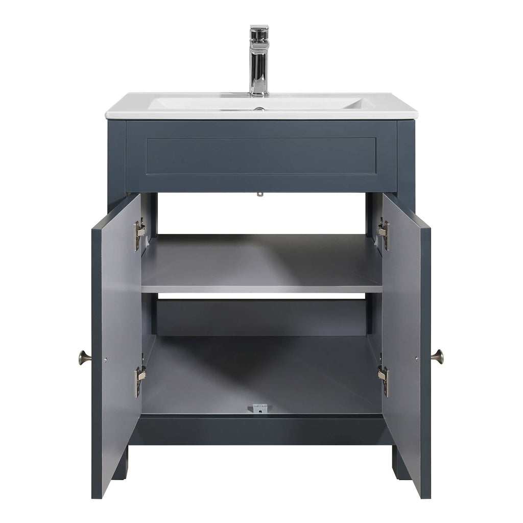 Modern grey bathroom vanity unit with a white ceramic sink and chrome tap, featuring open storage drawers; perfect for contemporary bathroom design.