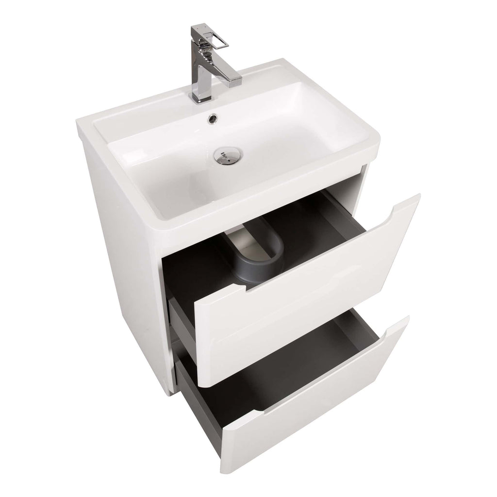 Modern white bathroom vanity with integrated sink and sleek chrome faucet for stylish and functional bathroom storage solutions.