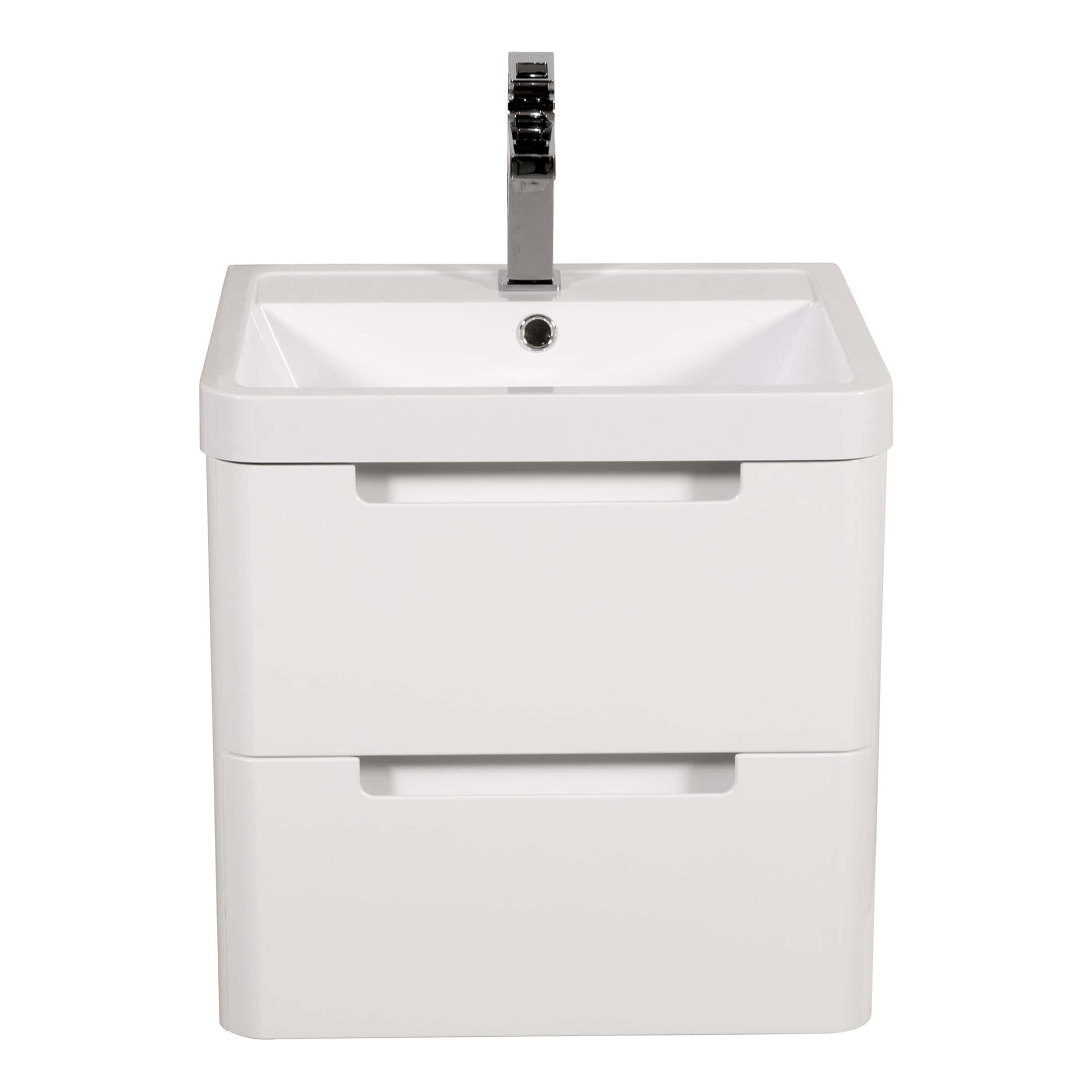 Contemporary white bathroom vanity with integrated sink and chrome faucet, ideal for modern bathroom renovations and space-saving designs. Perfect for a sleek and clean bathroom look.
