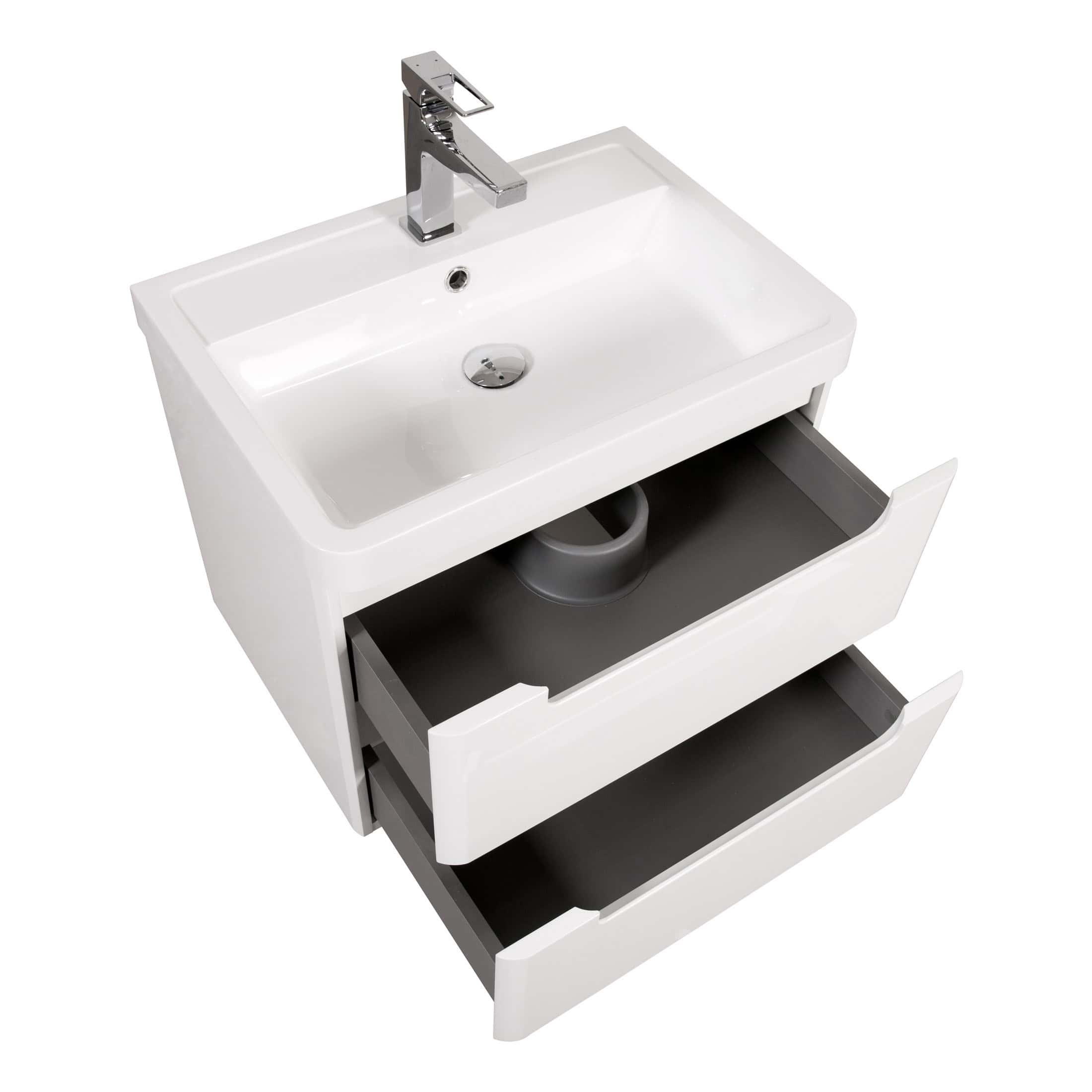 Modern white bathroom vanity unit with integrated sink, chrome tap, and open drawers for stylish bathroom storage solutions.