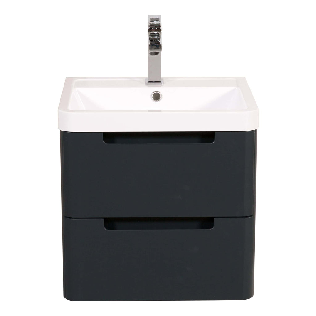 Modern bathroom vanity with integrated sink and chrome tap, featuring sleek black storage drawers for bathroom essentials. Perfect for contemporary bathroom design.