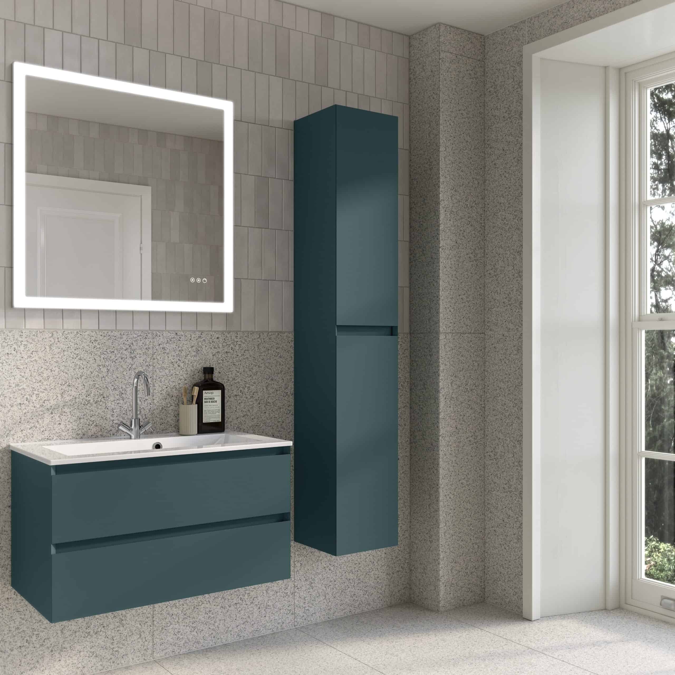 Sleek modern blue bathroom vanity with integrated sink, mirror with LED lighting, and tall storage cabinet, designed for contemporary bathroom storage and organisation.