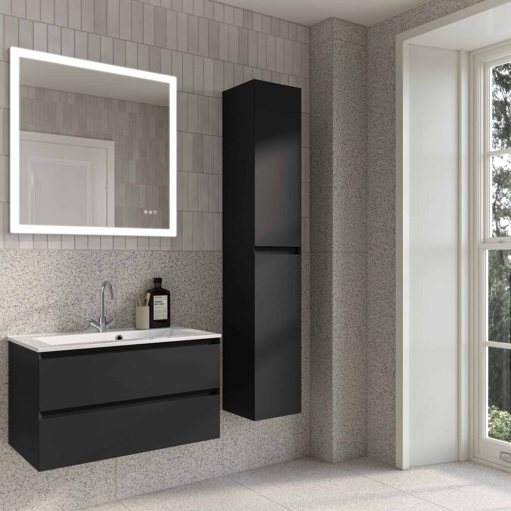 Minimalist black bathroom vanity unit with a matching tall storage cabinet, modern illuminated mirror, and sleek fixtures in a contemporary bathroom setting. Perfect for stylish bathroom organisation.