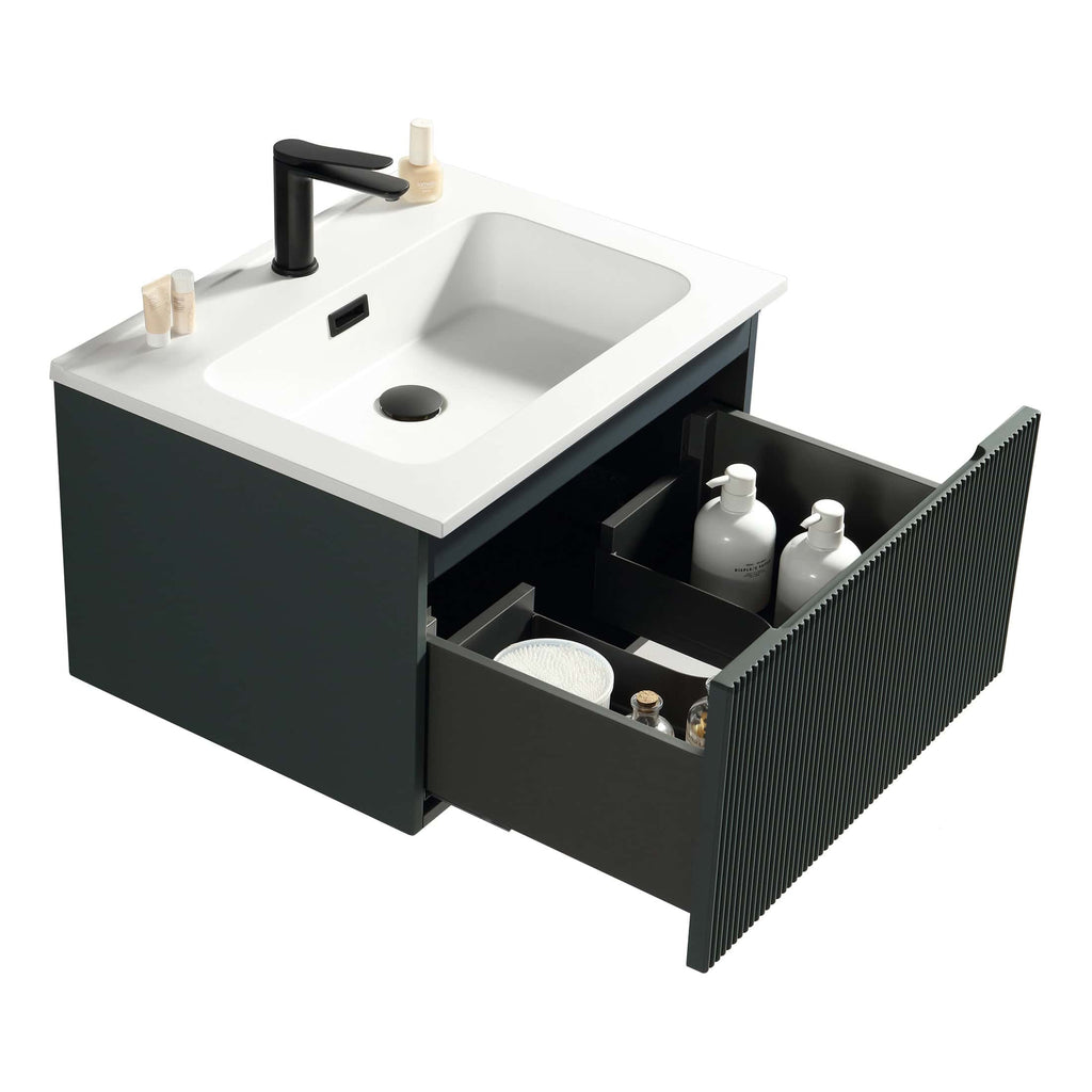 Sleek modern bathroom vanity with integrated sink, black matte faucet, and open storage drawer containing toiletries and bath essentials, ideal for contemporary bathroom designs.