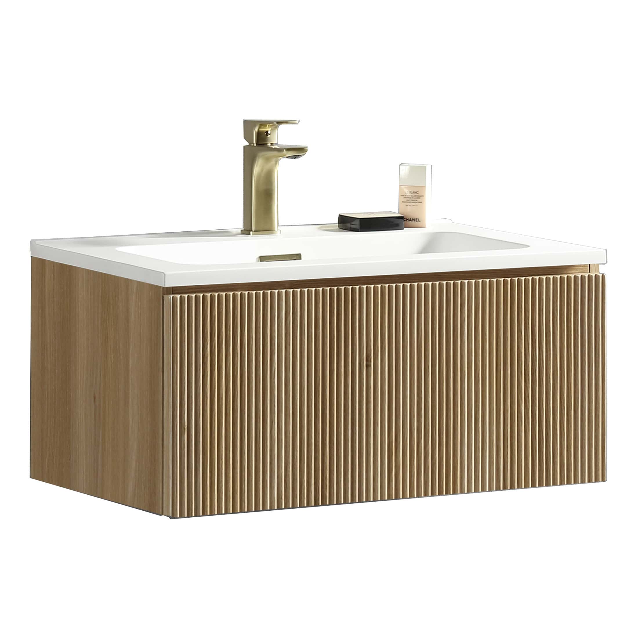 Sleek wooden bathroom vanity with white countertop and modern brass faucet, perfect for contemporary bathroom designs. Features stylish vertical slatted cabinetry for extra storage.