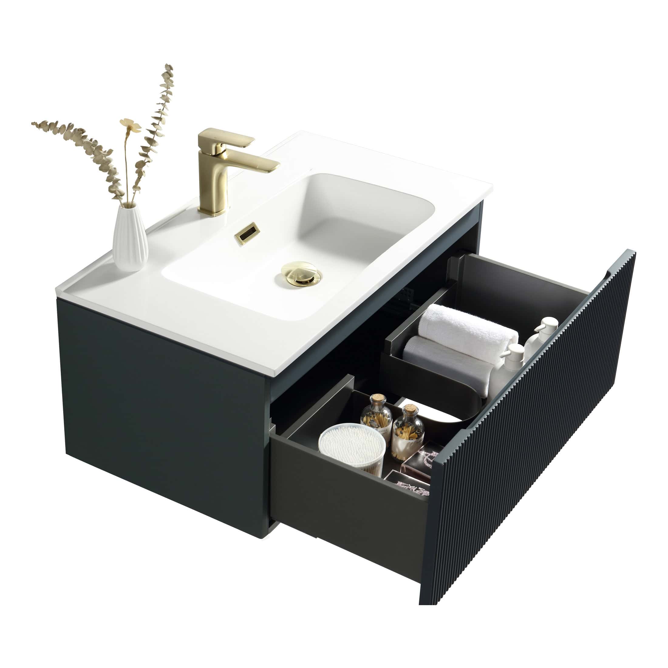 White bathroom vanity unit with black drawer, brass faucet, and storage for toiletries, towels, and skincare products, ideal for modern bathroom decor.