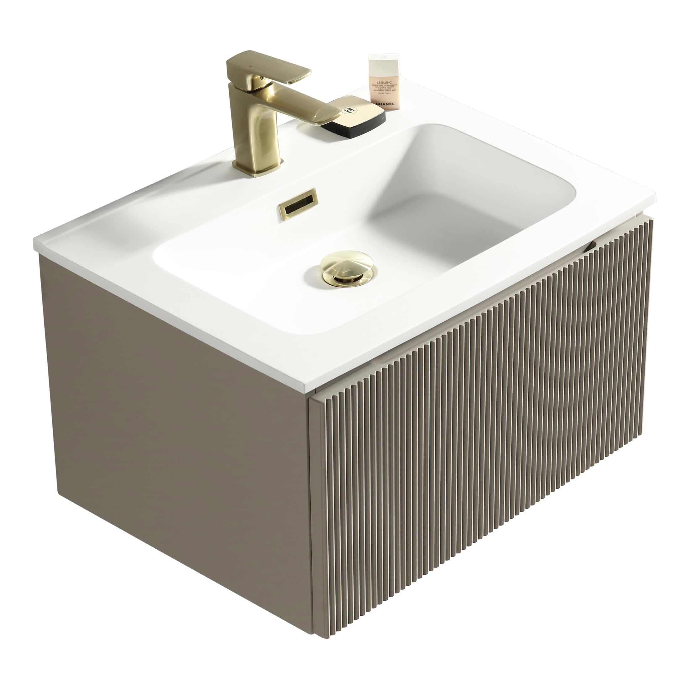 Sleek modern bathroom vanity with a white ceramic sink, gold-tone tap, and ribbed grey cabinet, perfect for stylish Bubly bathrooms.