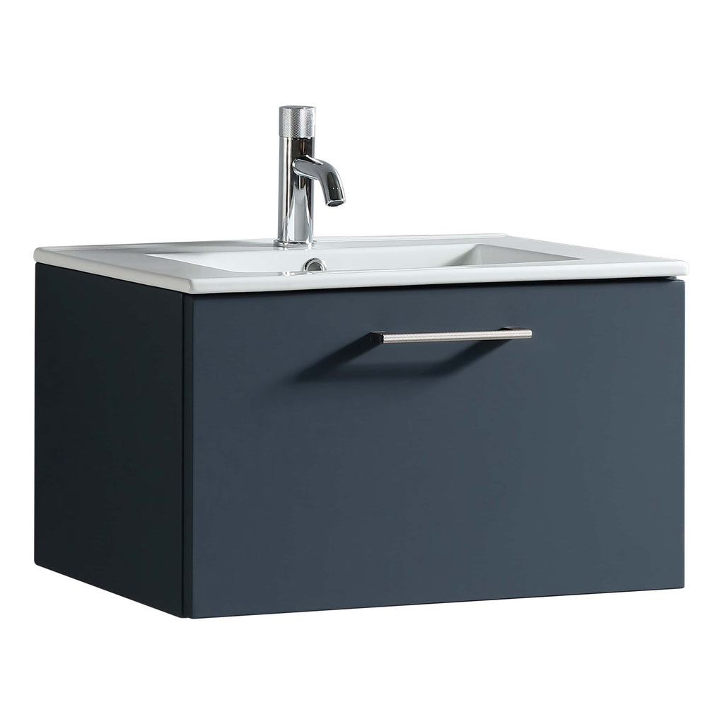 Sleek navy bathroom vanity with integrated sink and modern chrome faucet, perfect for contemporary bathroom designs. Space-saving storage with stylish handle for easy access.