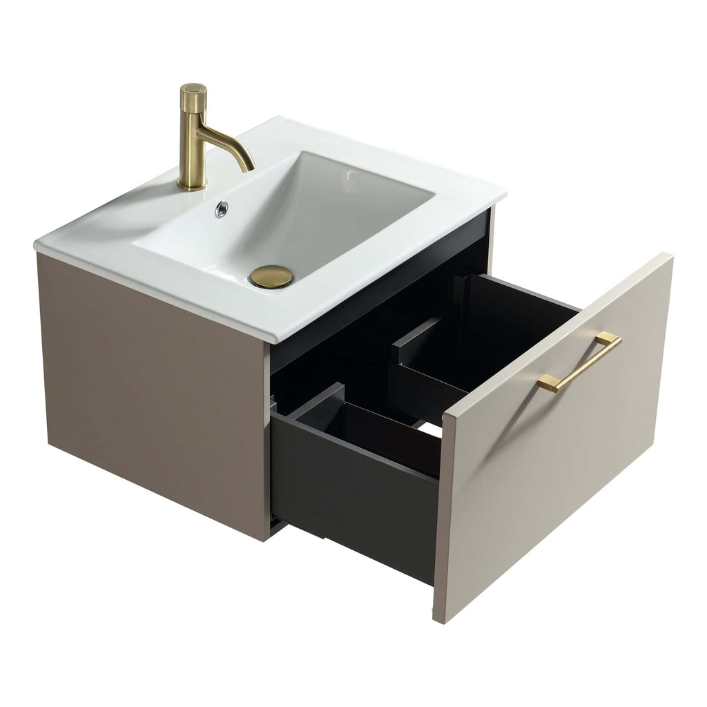 Sleek modern bathroom vanity with white ceramic sink, gold fixtures, and spacious storage drawer in neutral beige and black tones. Perfect for contemporary bathroom decor.