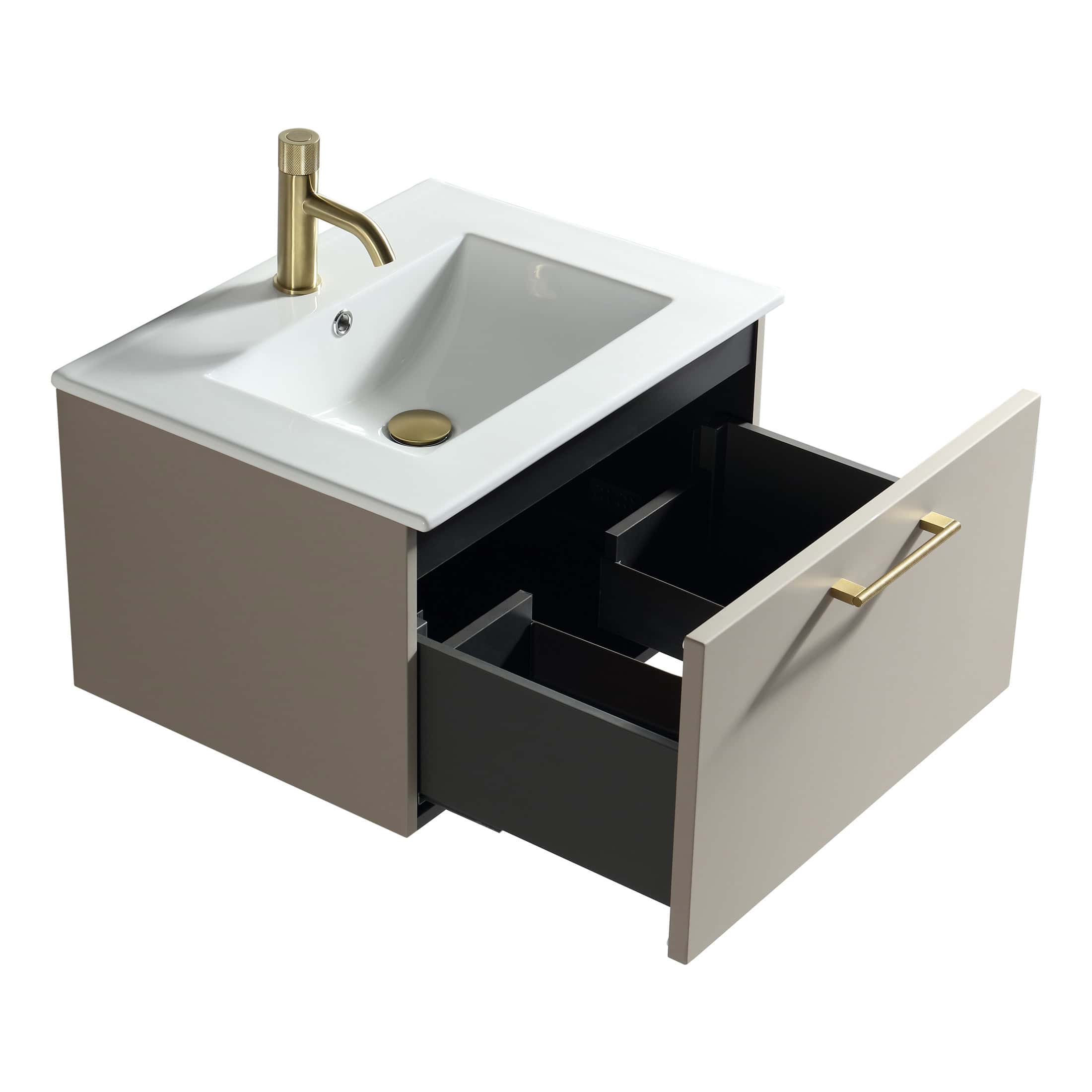 Sleek modern bathroom vanity with white ceramic sink, gold fixtures, and spacious storage drawer in neutral beige and black tones. Perfect for contemporary bathroom decor.