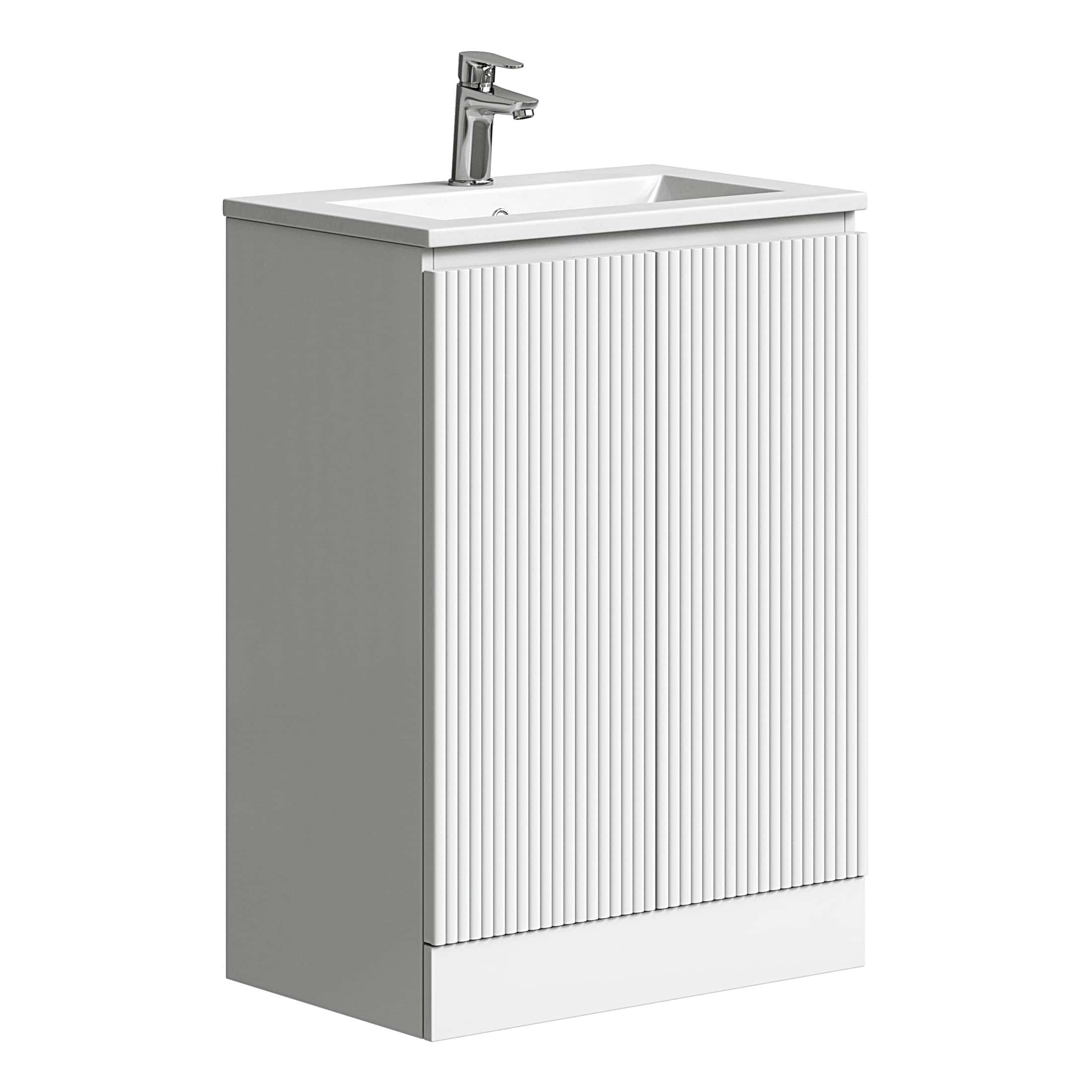 Modern white bathroom vanity with ribbed cabinet door and integrated top-mounted sink, designed for stylish and functional bathroom interior.