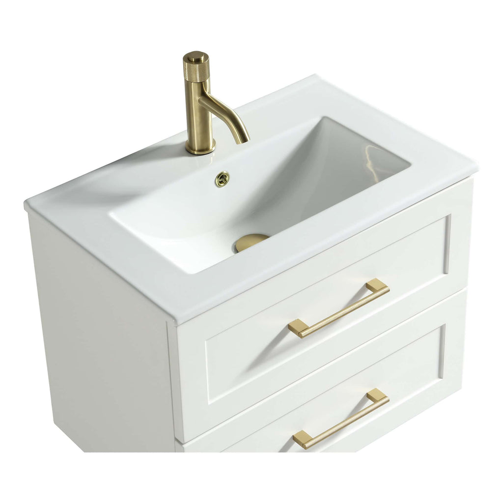 Polished gold bathroom sink with integrated vanity and brass handles, modern design, perfect for luxury bathrooms.