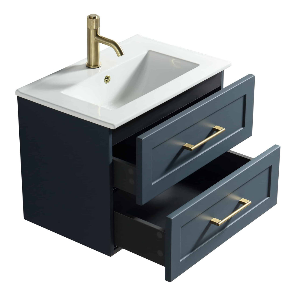 Modern navy bathroom vanity with white ceramic sink and brass hardware, ideal for contemporary bathroom designs.