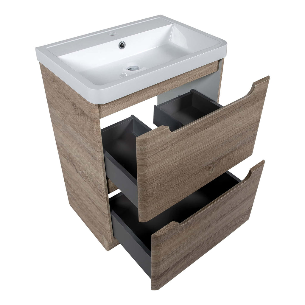 Contemporary bathroom vanity with a white inset sink and natural wood finish cabinetry, featuring two black drawers for storage, ideal for modern bathroom interiors.
