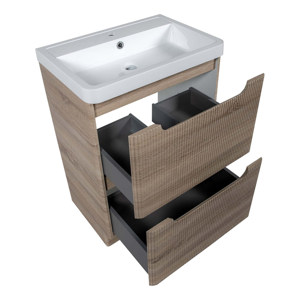 Modern bathroom vanity unit with integrated sink, wooden drawers, and sleek black handles, ideal for contemporary bathroom designs. Perfect for storing bathroom essentials with style.