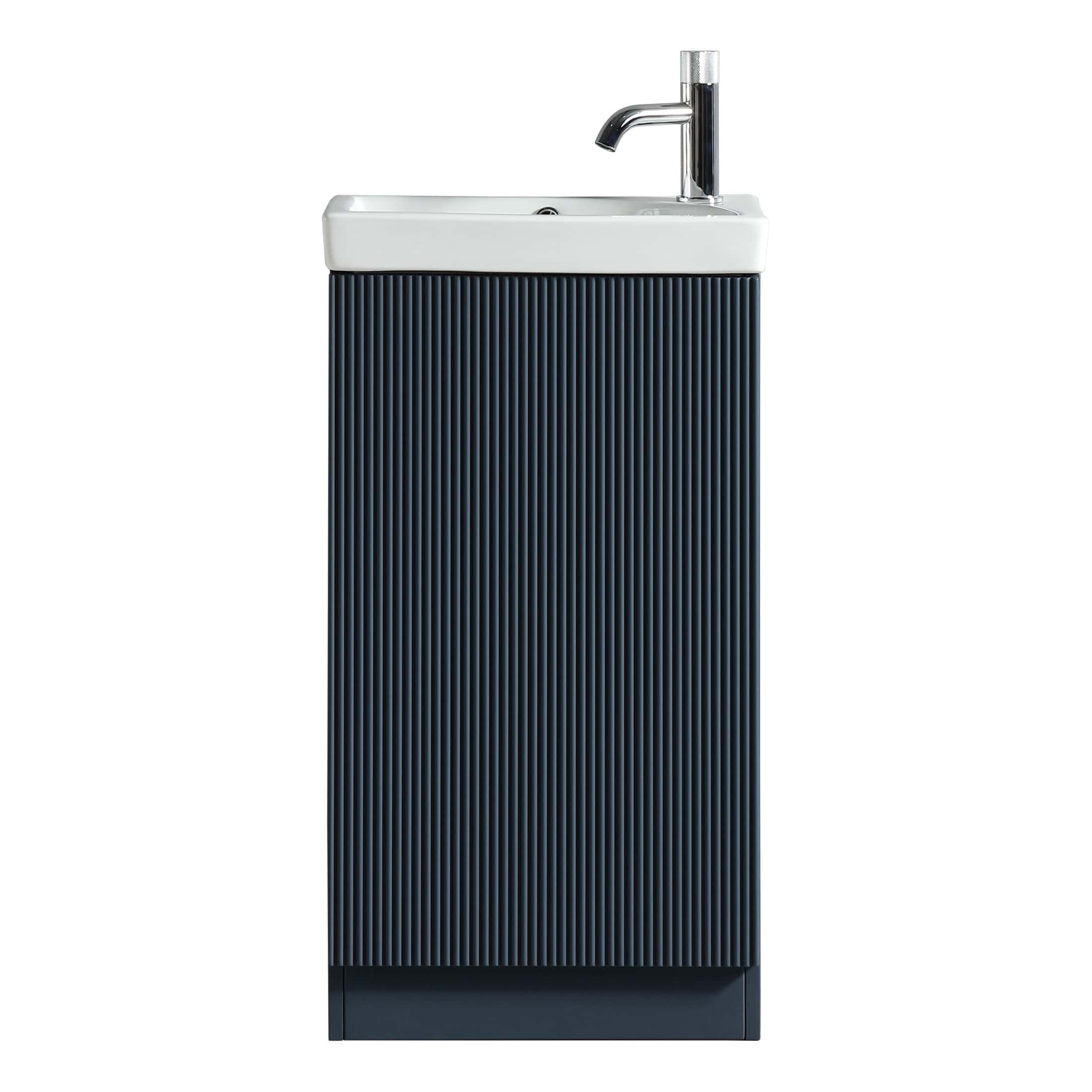 Sleek black bathroom vanity with integrated sink and chrome faucet, perfect for modern bathroom designs. Stylish, space-saving, with textured vertical paneling for a contemporary look.