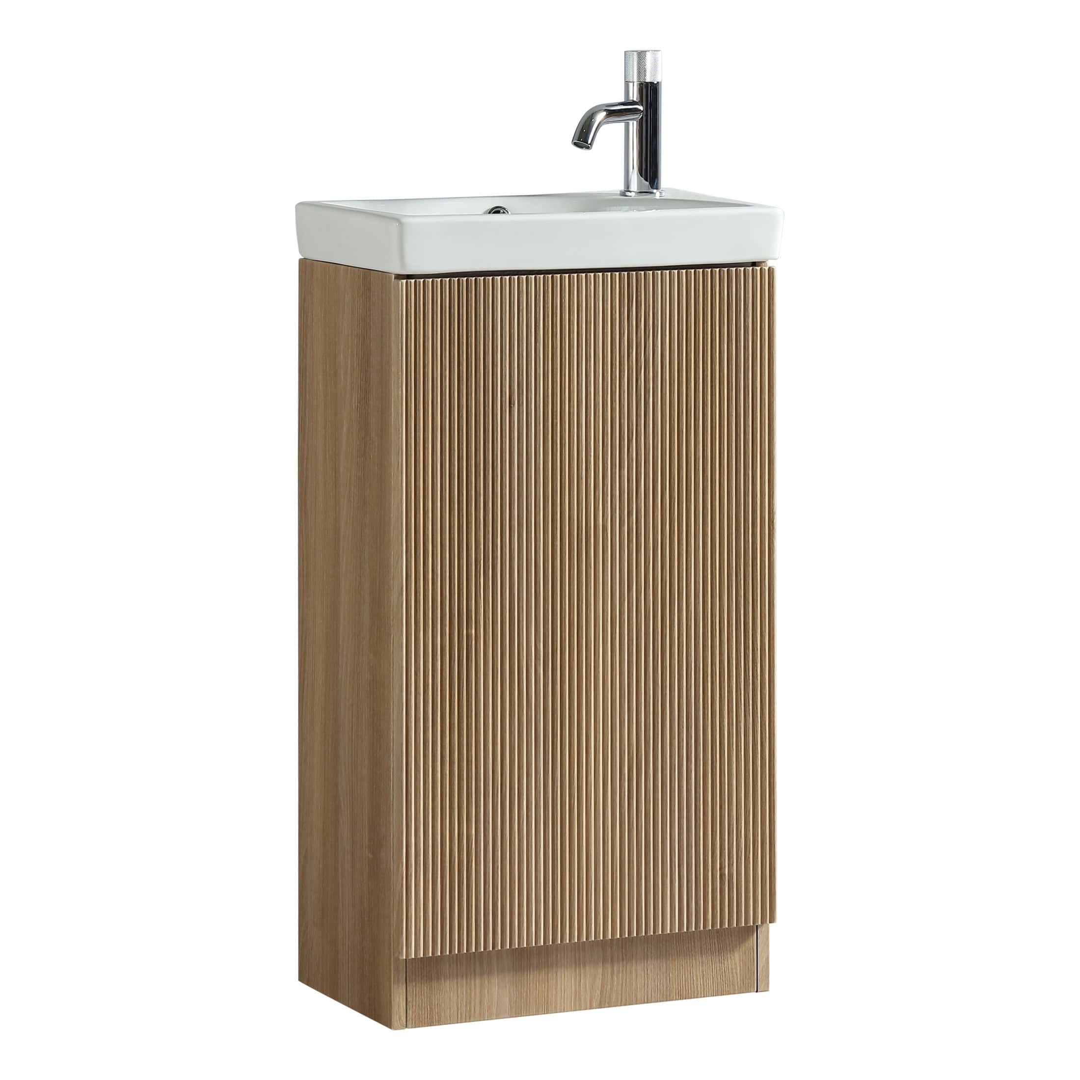 Sleek bathroom vanity with a modern white sink and wooden slatted cabinet, perfect for stylish bathroom storage and sink setup.