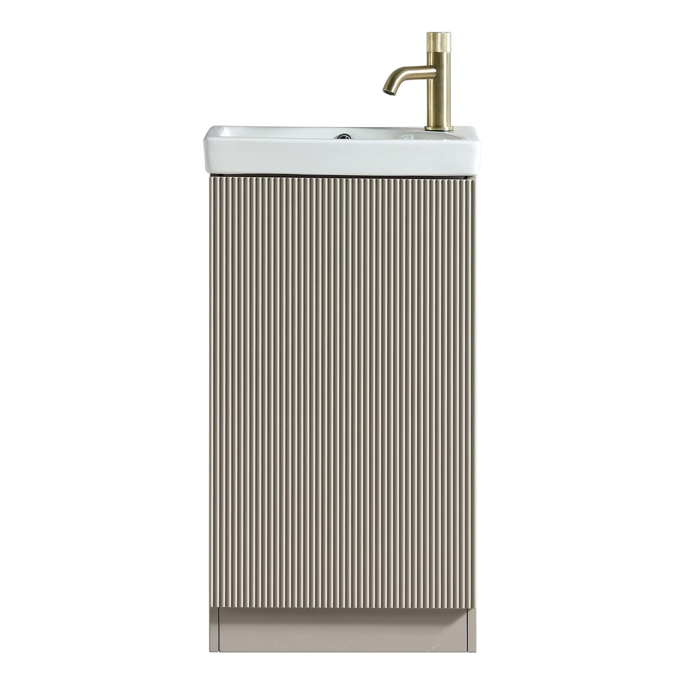 Sleek modern bathroom vanity with vertical ribbed cabinet and integrated sink, featuring a brushed gold tap, perfect for stylish bathroom storage and organisation.