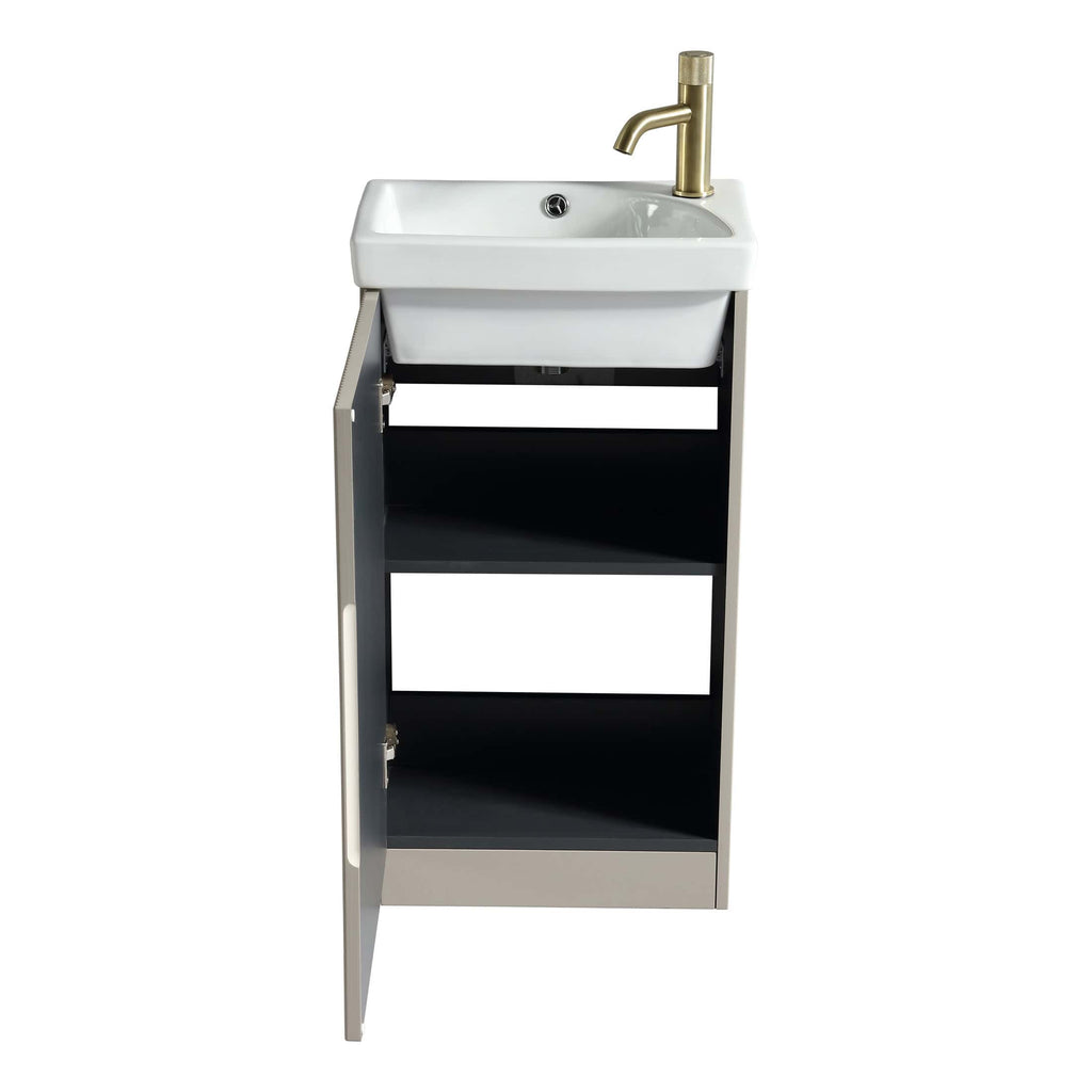 Modern bathroom sink with a sleek black vanity cabinet and a stylish gold tap, perfect for contemporary bathroom or powder room redesign. Ideal for enhancing functionality and style.