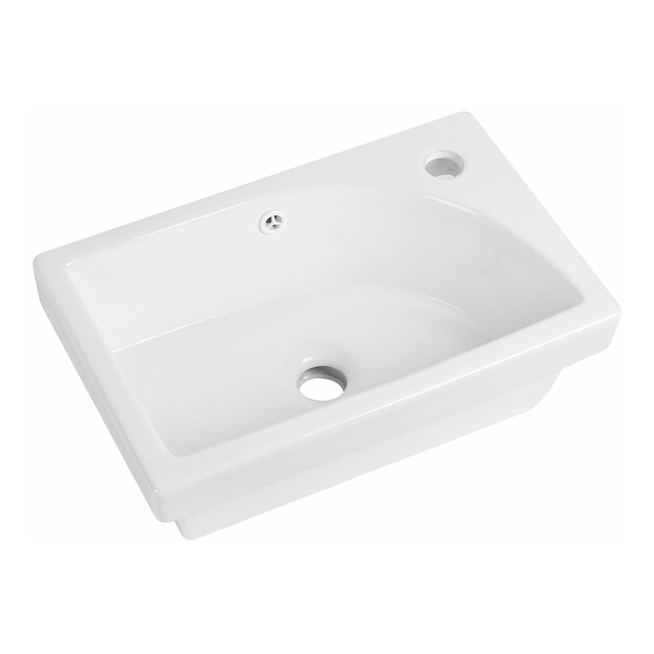White ceramic bathroom sink with modern rectangular design and easy-to-clean surface. Ideal for contemporary bathrooms, featuring overflow and multiple tap fitting options for versatile use.