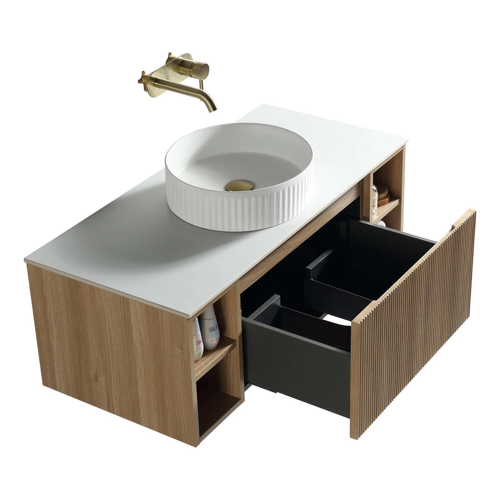 Sleek modern bathroom vanity with a round ceramic sink, brass faucet, and natural wood finish, designed for stylish and functional bathroom decor.