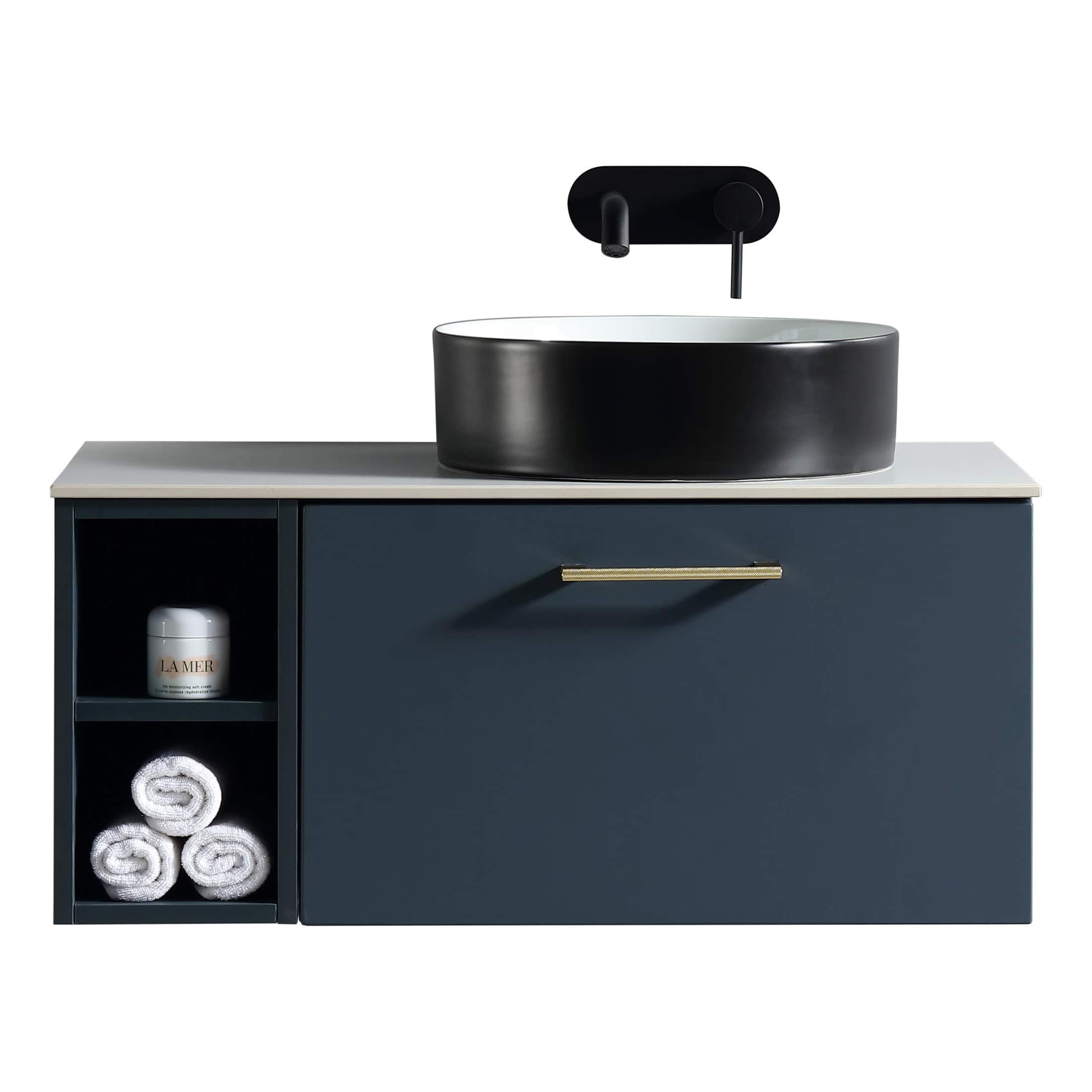 Modern bathroom vanity unit with black basin and sleek fixtures, perfect for contemporary bathrooms, featuring storage shelves for towels and toiletries, and a stylish gold handle.
