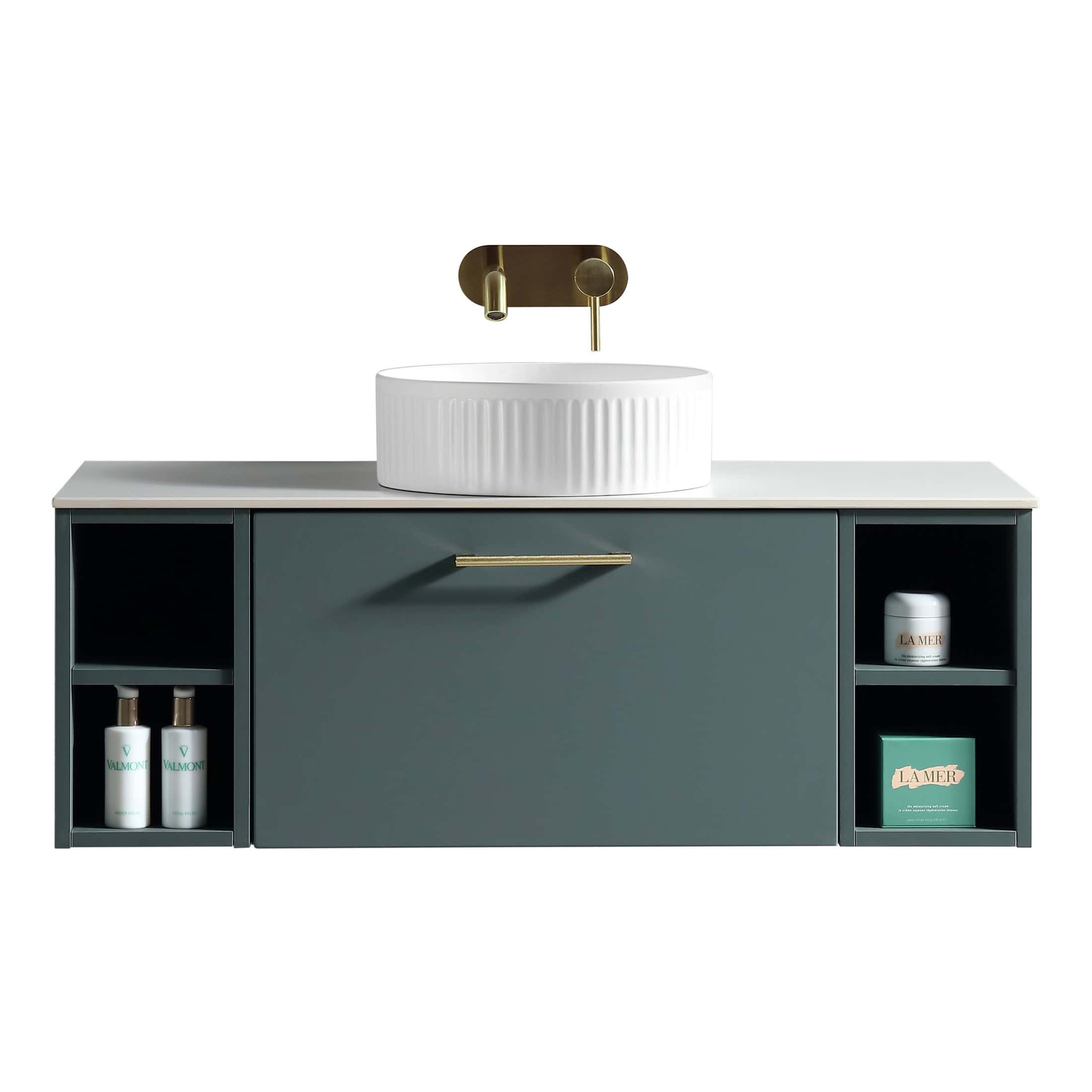 Sleek modern bathroom vanity with a ceramic vessel sink, wall-mounted brass faucet, and built-in storage for toiletries, perfect for contemporary bathroom designs.